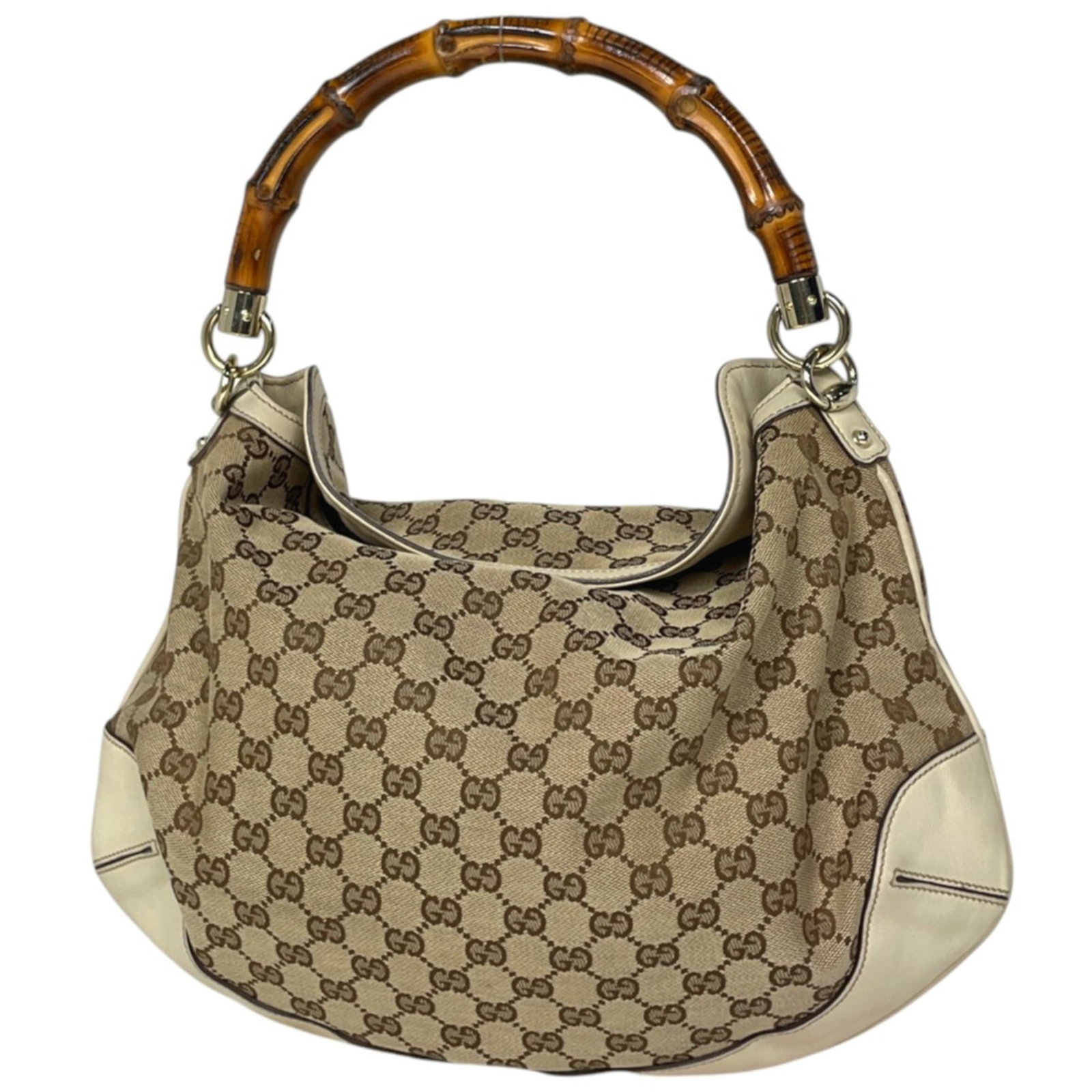 Gucci Shoulder Bag Gg Canvas Leather: Gucci Shoulder Bag Gg Canvas Leather Gucci's GG canvas leather shoulder bag boasts a classic design with clean lines and a timeless beige and white color combination. Made from high-quality