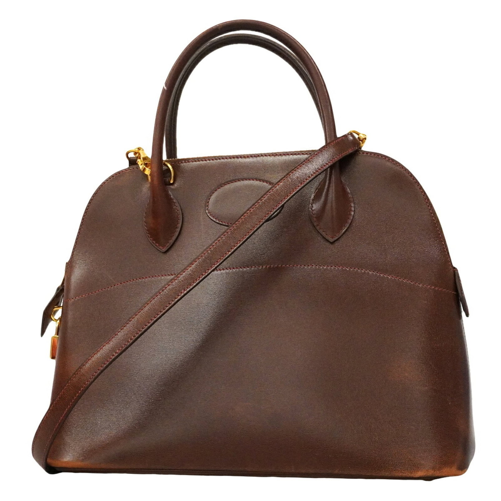 Calf leather handbag box by Hermes: Calf leather handbag box by Hermes Box calf leather construction provides a rich, luxurious feel to this brown handbag box from Hermes. Measuring 24cm x 31cm x 12cm, it features gold hardware and a