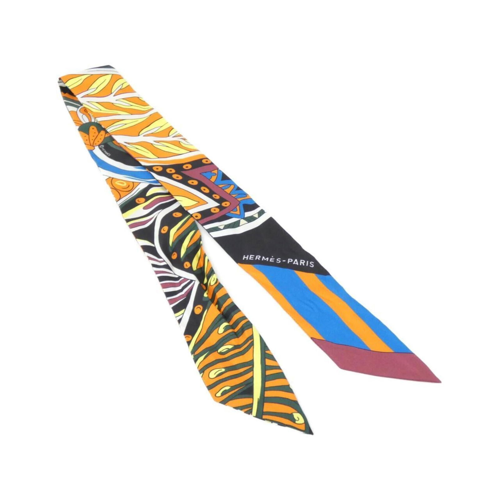 Silk by Hermes: Silk by Hermes Silk by Hermes, a luxurious black and orange scarf, measures 5cm x 86cm in size. This high-quality silk scarf features the iconic brand's signature style and craftsmanship. Made from