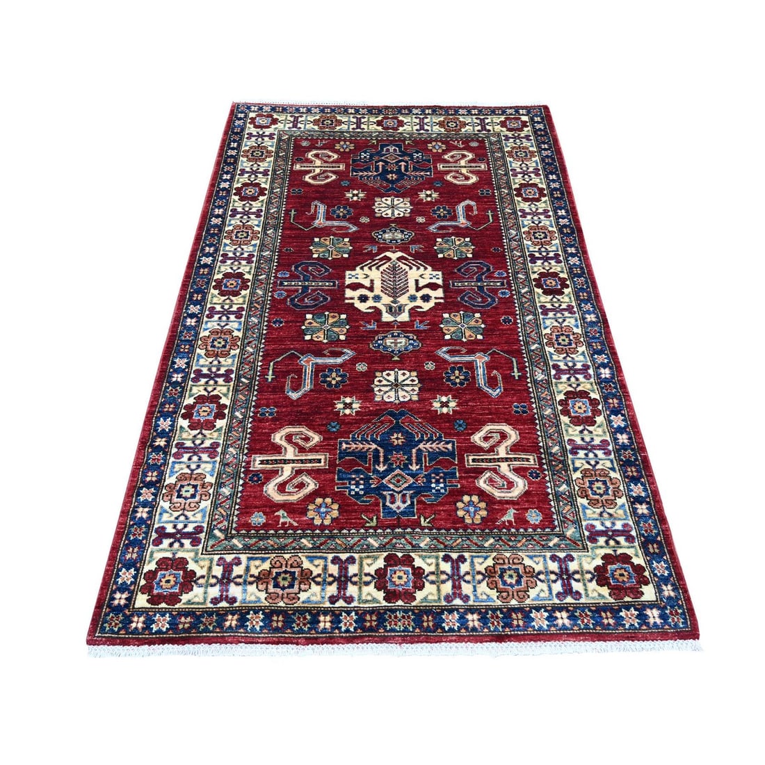 4'x6'4" Red Afghan Super Kazak Hand Knotted Pure Wool Rug: 4'x6'4" Red Afghan Super Kazak Hand Knotted Pure Wool Rug This stunning 4'x6'4" Red Afghan Super Kazak Hand Knotted Pure Wool Rug boasts an all-over regional design in a vibrant red field, accented by