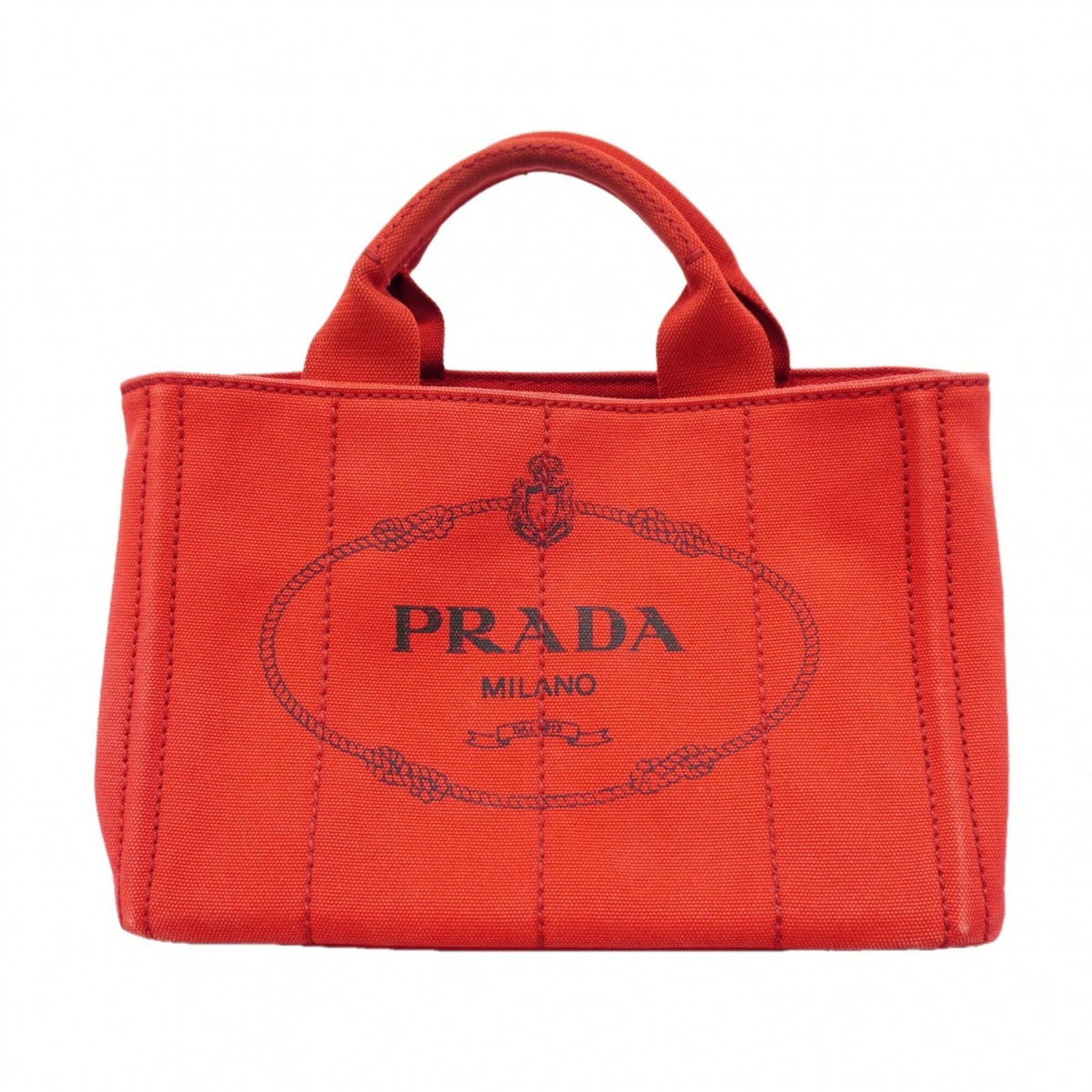 Canvas Prada Tote: Canvas Prada Tote Canvas Prada Tote in Red with Gold Hardware. This canvas tote bag features a striking red color and gold hardware, measuring 18.5cm x 28.5cm x 16cm. The signature bears a