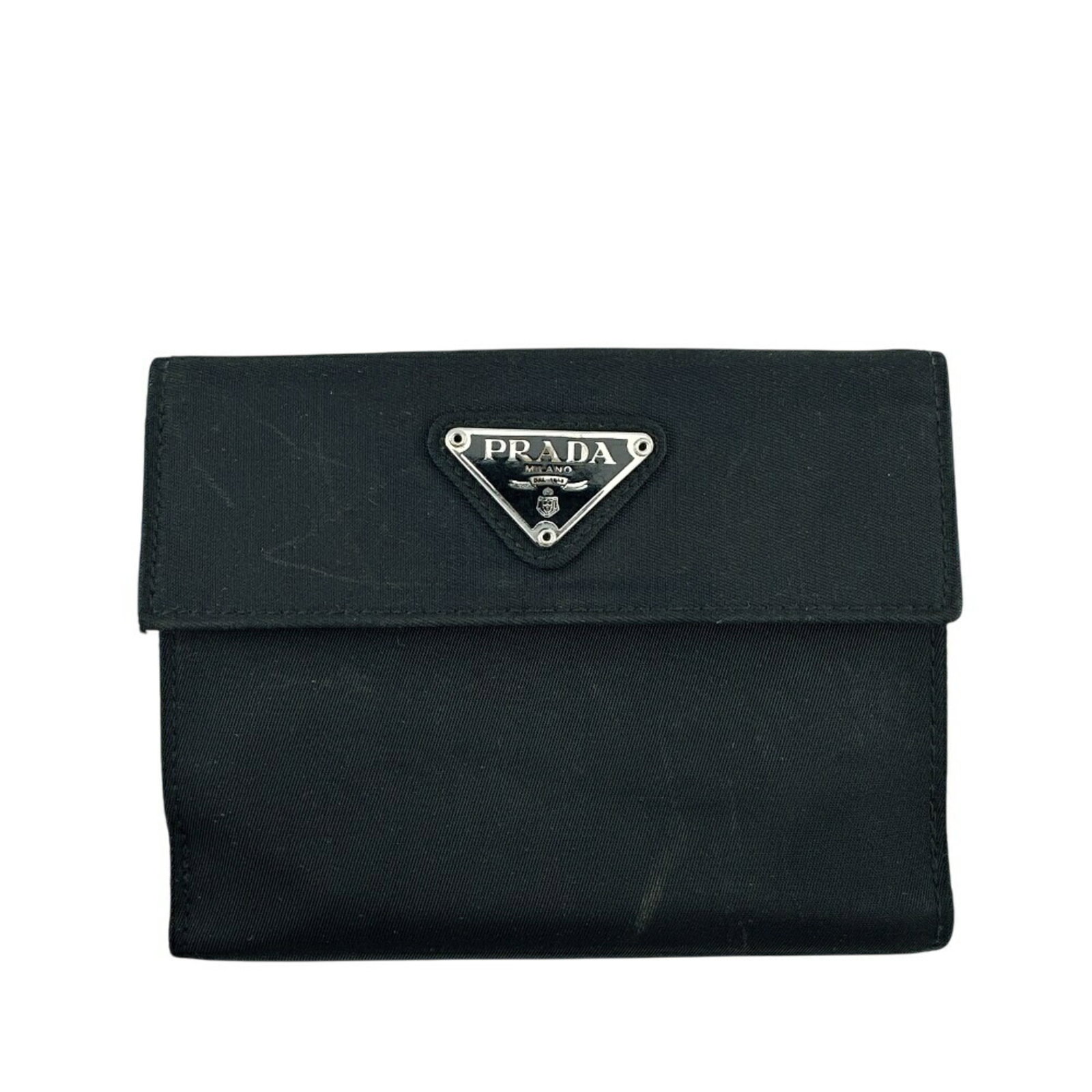 Nylon Bi Fold Wallet By Prada: Nylon Bi Fold Wallet By Prada Nylon bi-fold wallet by Prada, featuring a durable nylon material and compact design. This unisex wallet measures 9.5cm x 12cm / 3.74'' x 4.72'', making it a versatile