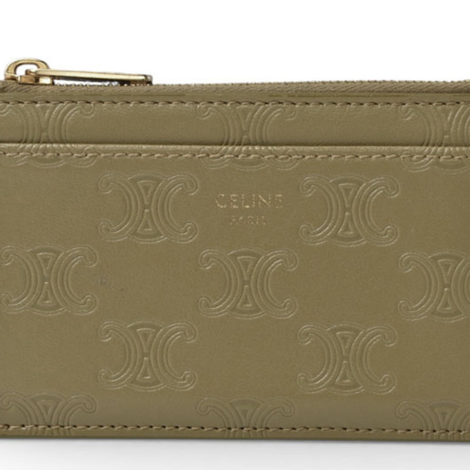 Card case of leather by Celine: Card case of leather by Celine Leather card case by Celine, crafted in Italy with an olive hue and measuring 7.5cm x 11.3cm x 1cm. Made from high-quality leather, this compact accessory features a