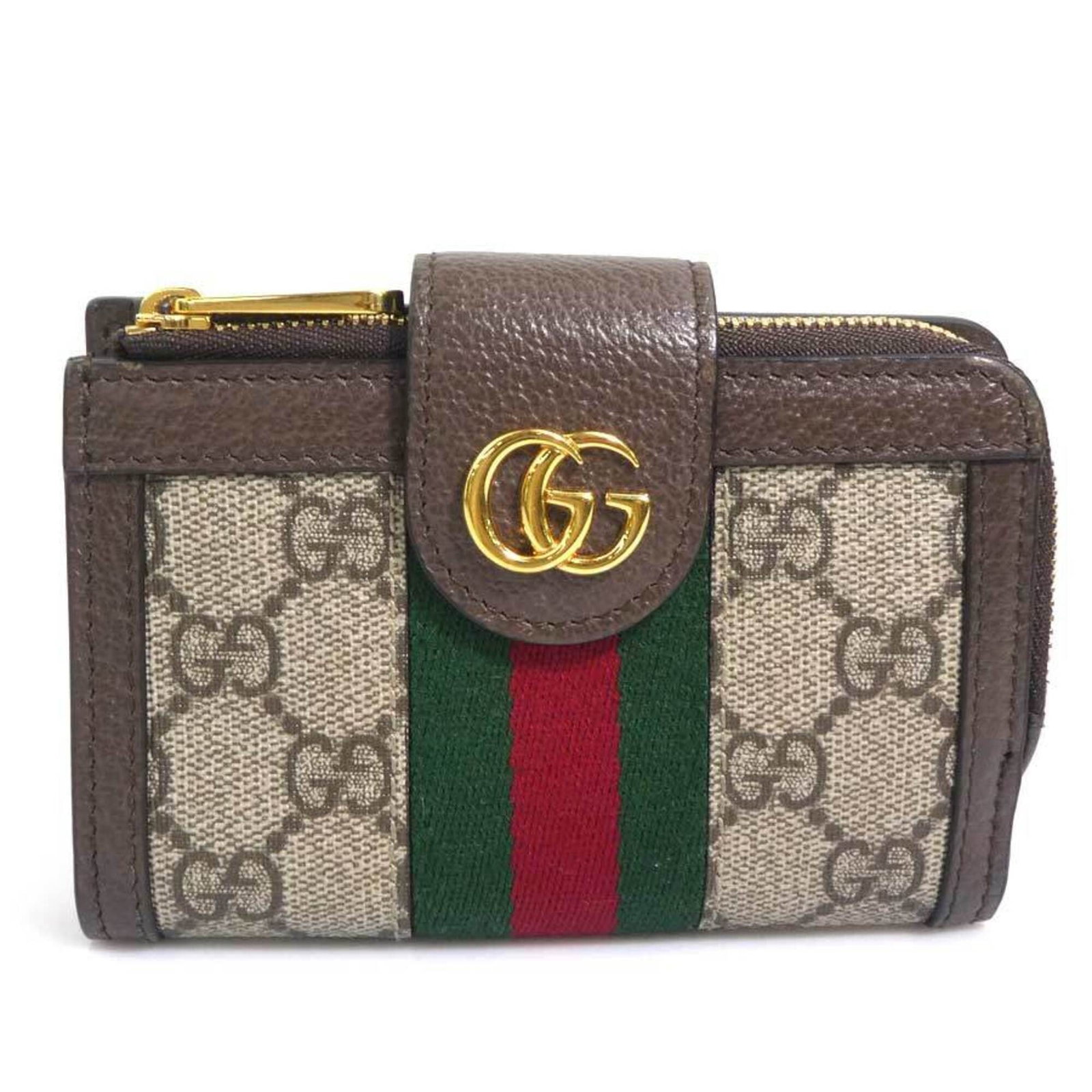 Bi fold wallet gg supreme: Bi fold wallet gg supreme Bi-fold wallet with GG Supreme design, crafted from high-quality materials and featuring a classic brown color. Measuring 10cm x 13.5cm x 2.3cm, it offers a stylish and