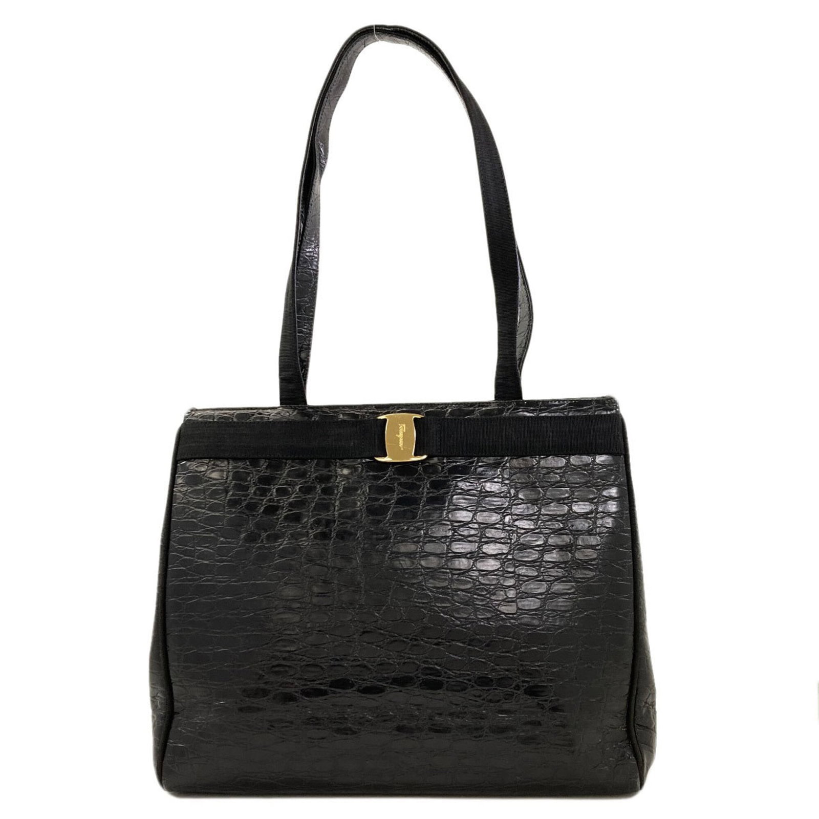 Salvatore Ferragamo Tote Bag Leather: Salvatore Ferragamo Tote Bag Leather Black embossed leather tote bag from Salvatore Ferragamo, measuring 28.5cm x 34cm x 11cm and featuring a 64cm long handle. This classic design showcases the