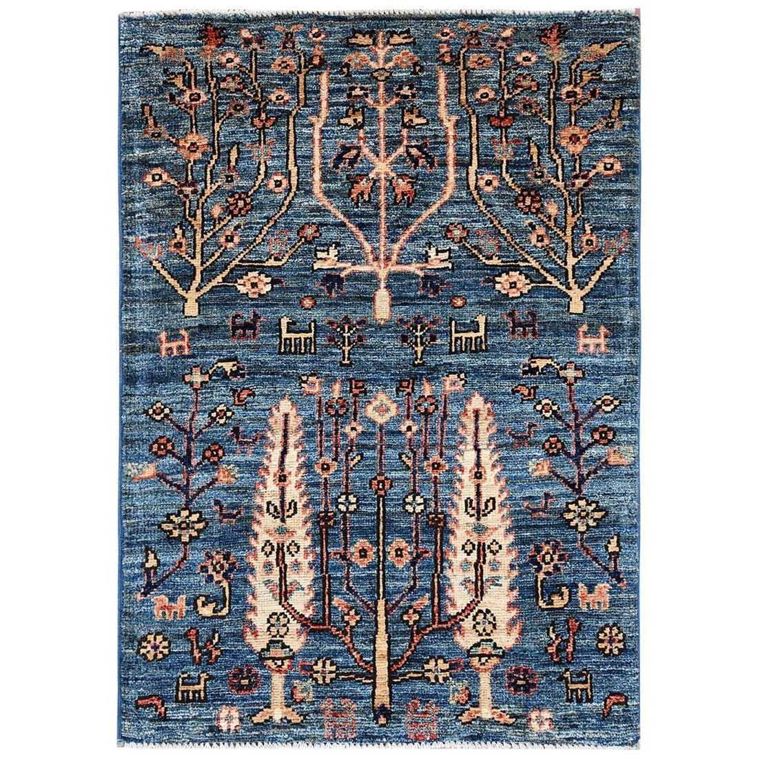 2'2"x3'4" Blue Tree Design with Animal Figurines Hand Knotted Wool Mat Rug: 2'2"x3'4" Blue Tree Design with Animal Figurines Hand Knotted Wool Mat Rug This beautiful hand-knotted wool mat rug features an all-over blue tree design with intricate animal figurines, showcasing