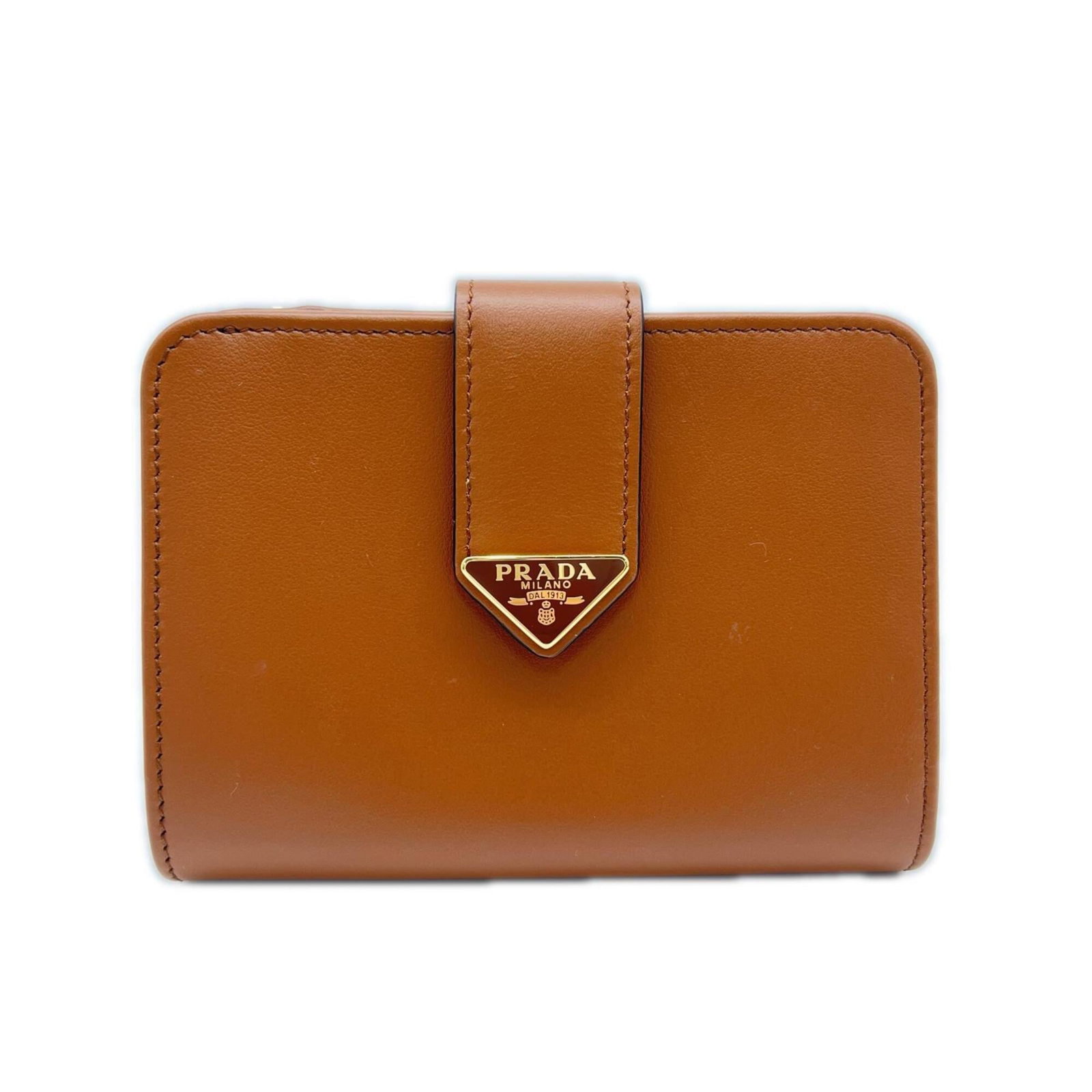 Saffiano Bi Fold Wallet: Saffiano Bi Fold Wallet Saffiano bi-fold wallet from Prada, featuring a classic design with clean lines and premium materials. Made with durable Saffiano leather, this wallet measures 8.5cm x 12cm x