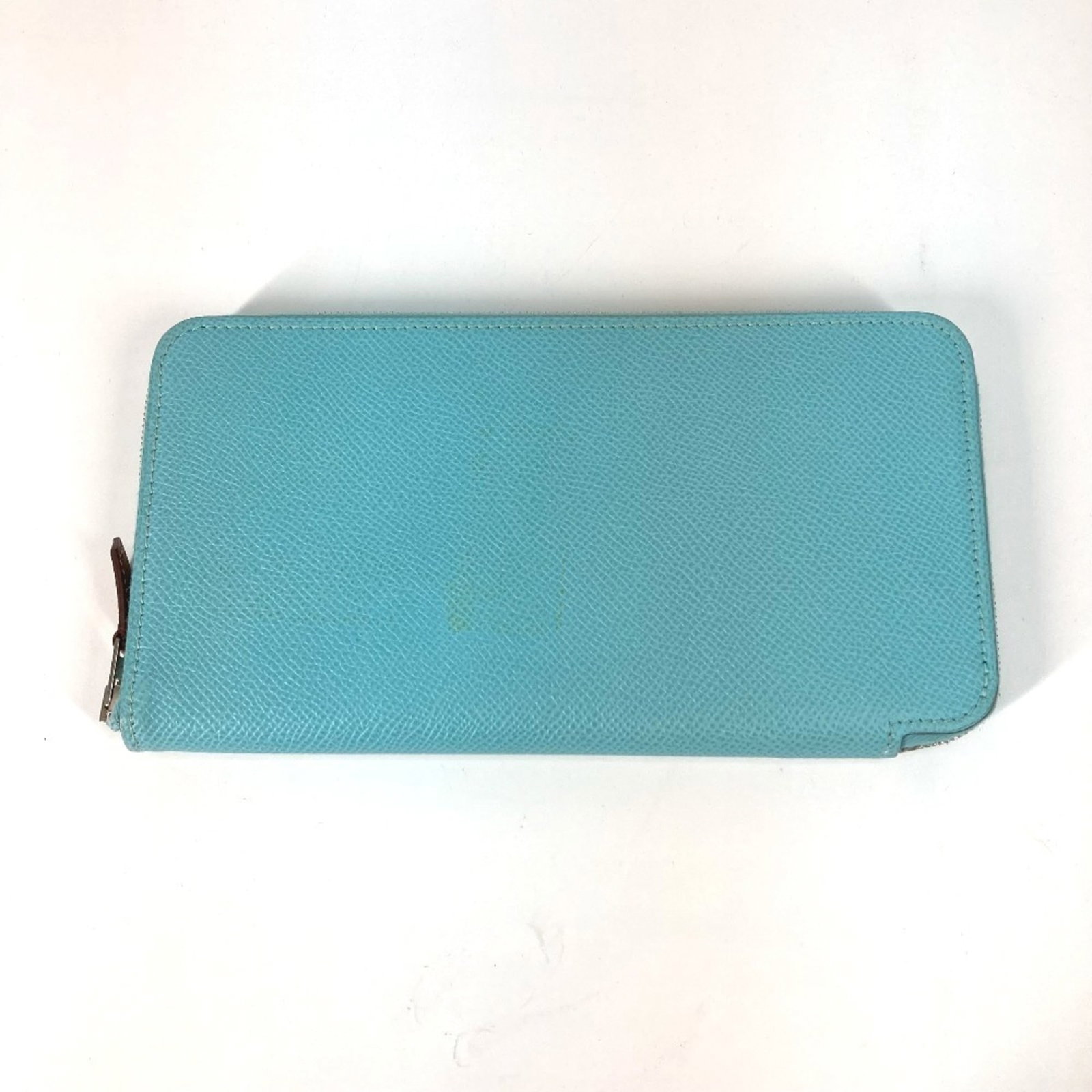 Hermes Chain/ Shoulder Wallet Epsom Leather: Hermes Chain/ Shoulder Wallet Epsom Leather Epsom leather craftsmanship meets modern style in this sleek chain/shoulder wallet from Hermes. The vibrant blue and pink hues add a pop of color to any