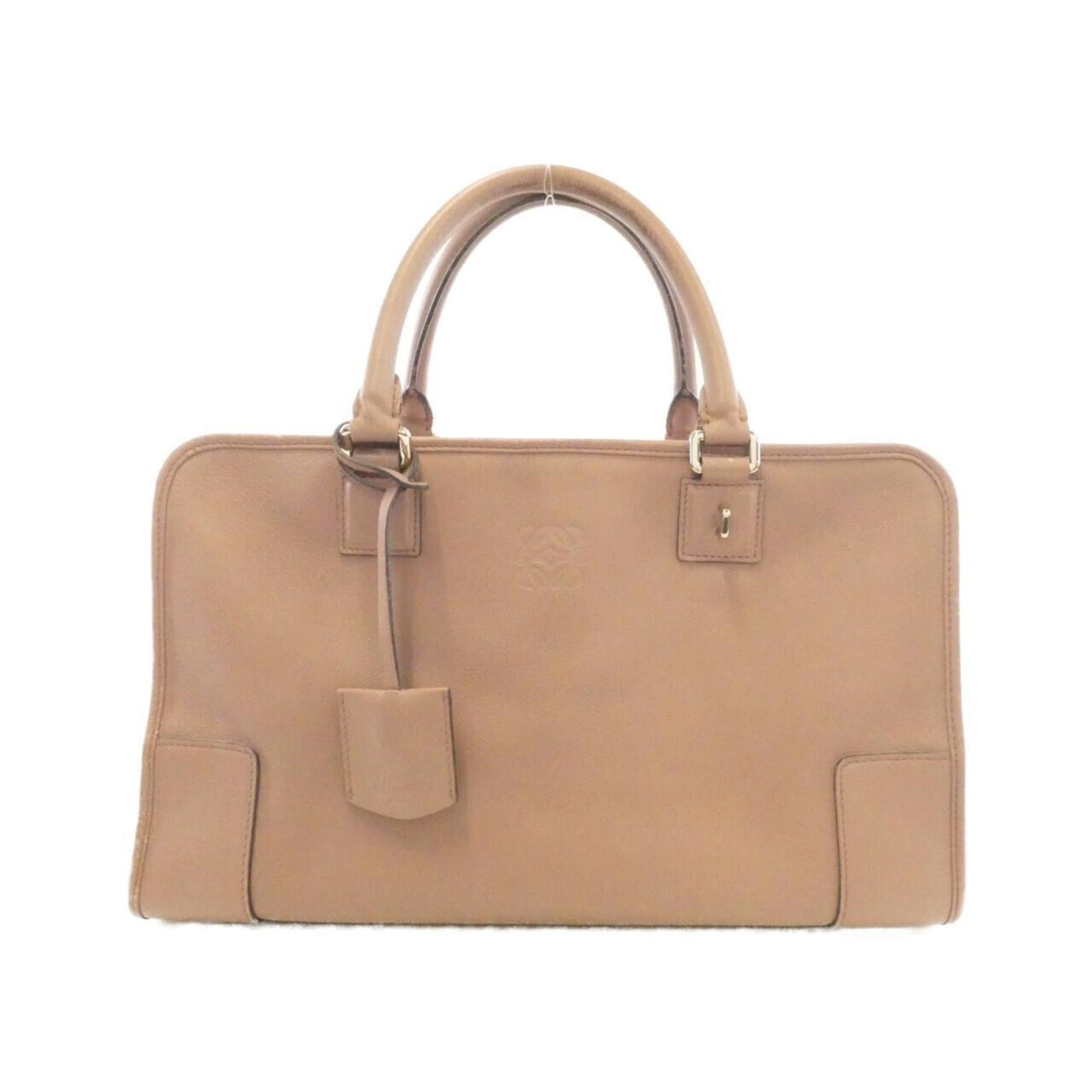 Handbag Leather by Loewe: Handbag Leather by Loewe Handbag by Loewe, made from high-quality leather, features a distinctive pink color and silver hardware. Measuring 22cm x 36cm x 15cm, it offers a stylish and compact design