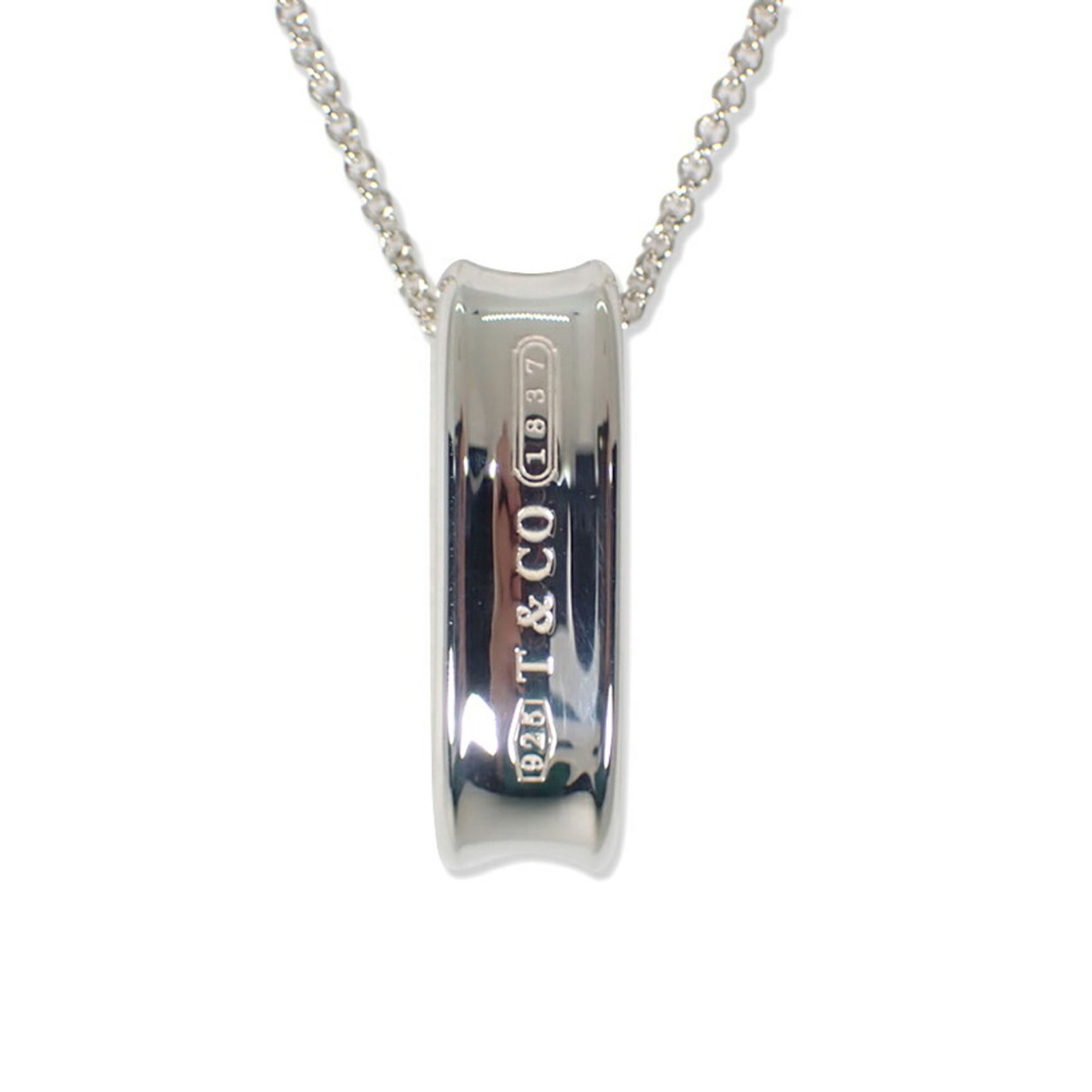 Tiffany & Co. 925 1837 Pendant Necklace: Tiffany & Co. 925 1837 Pendant Necklace Sterling silver 925 Tiffany & Co. pendant necklace features a classic design with a notable 1837 mark, adding historical significance to its timeless elegance. 