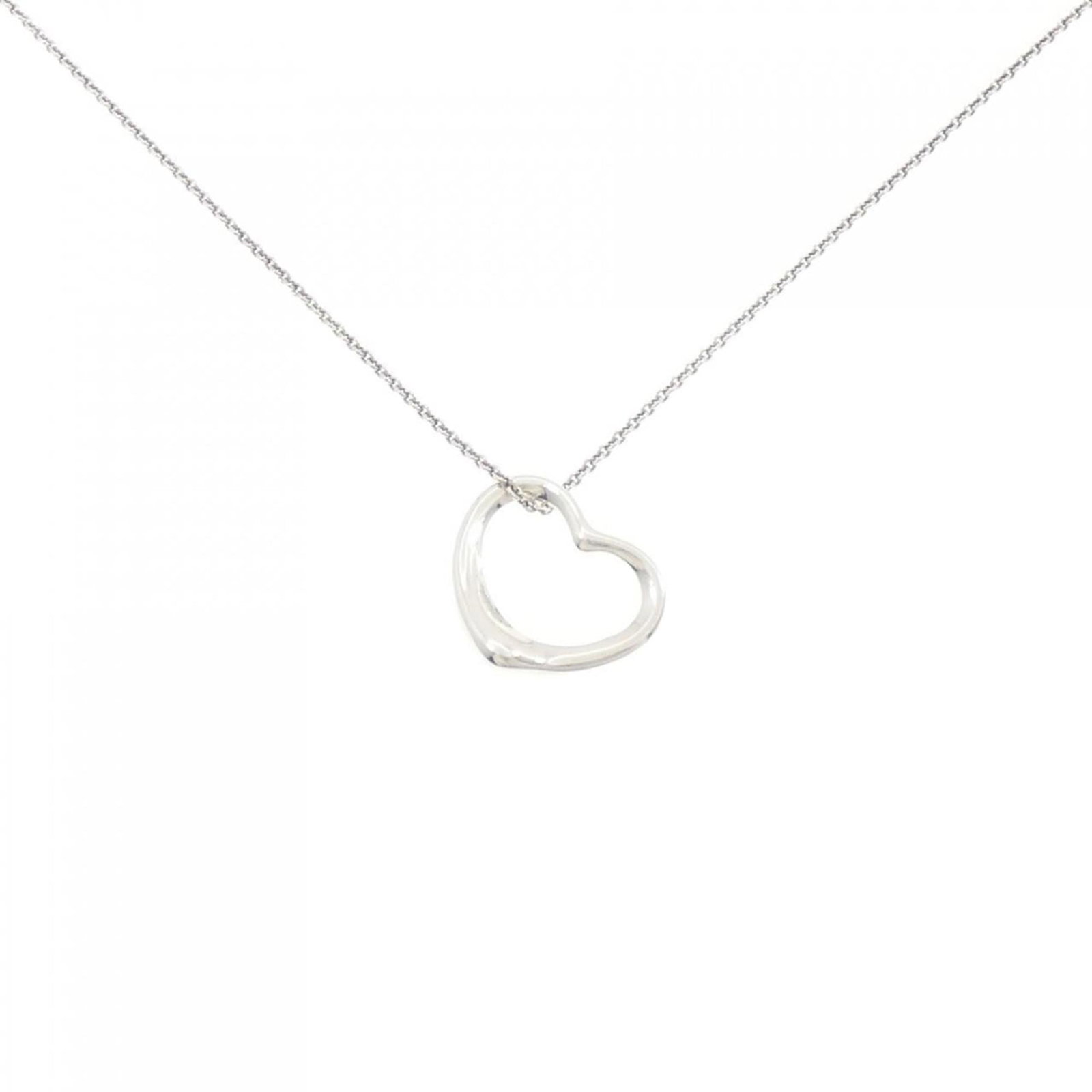 Open Heart Necklace by Tiffany: Open Heart Necklace by Tiffany Silver Open Heart Necklace by Tiffany features a sleek pendant with a 20.4mm x 19.8mm design, suspended from a 41 cm / 16.14'' chain. The necklace is crafted from