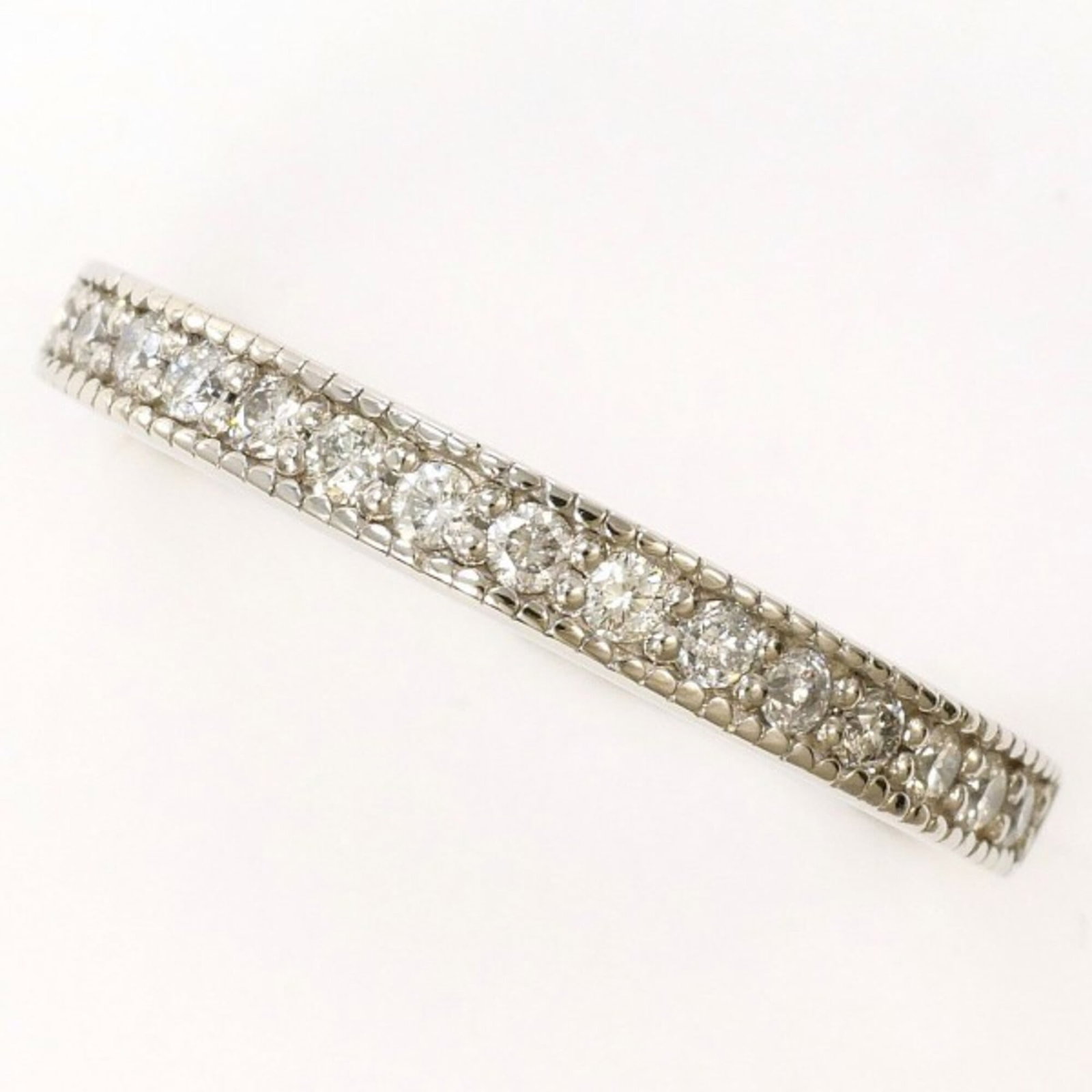 900 platinum band ring: 900 platinum band ring 900 platinum band ring with a diamond stone weighing 0.17 carats, set in a sturdy 2mm wide platinum band, available in size US 3.5. This platinum band showcases a high-quality d