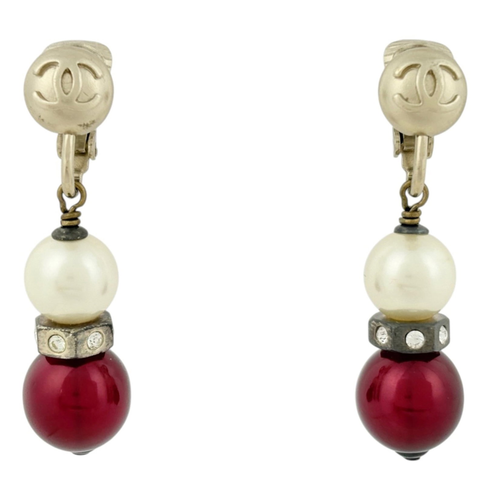 Chanel Clip Earrings Gold Plating Rhinestone: Chanel Clip Earrings Gold Plating Rhinestone Gold plating and rhinestones shine in these elegant clip earrings, a classic Chanel design. Measuring 40mm x 10mm, they add a touch of sophistication to an