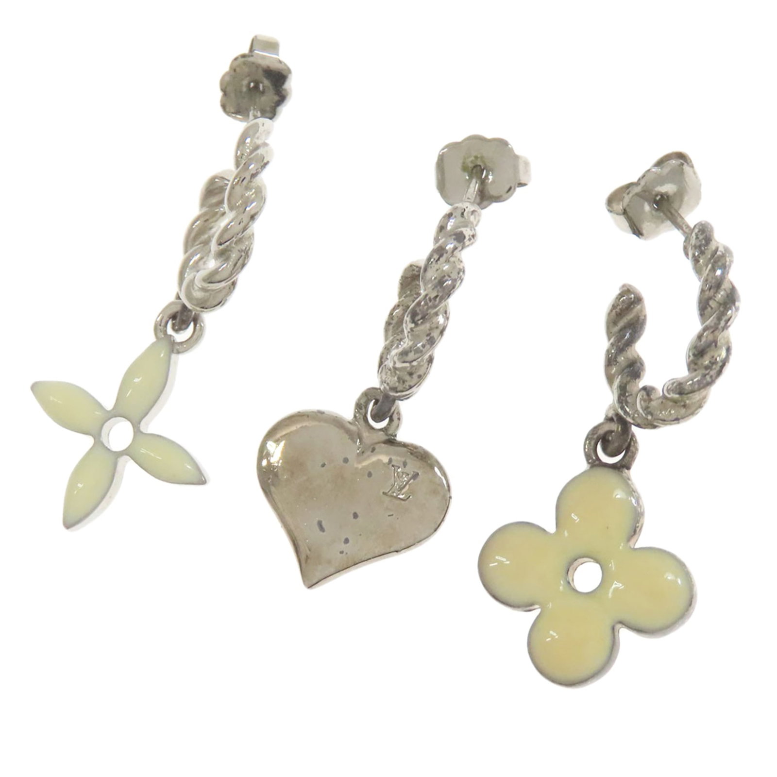 Metal Stud Earrings Louis Vuitton: Metal Stud Earrings Louis Vuitton Silver Metal Stud Earrings from Louis Vuitton, measuring 15.00mm x 15.00mm x 3.00mm in size, bearing a signature, and crafted from metal. Item Specifics: Brand: Louis