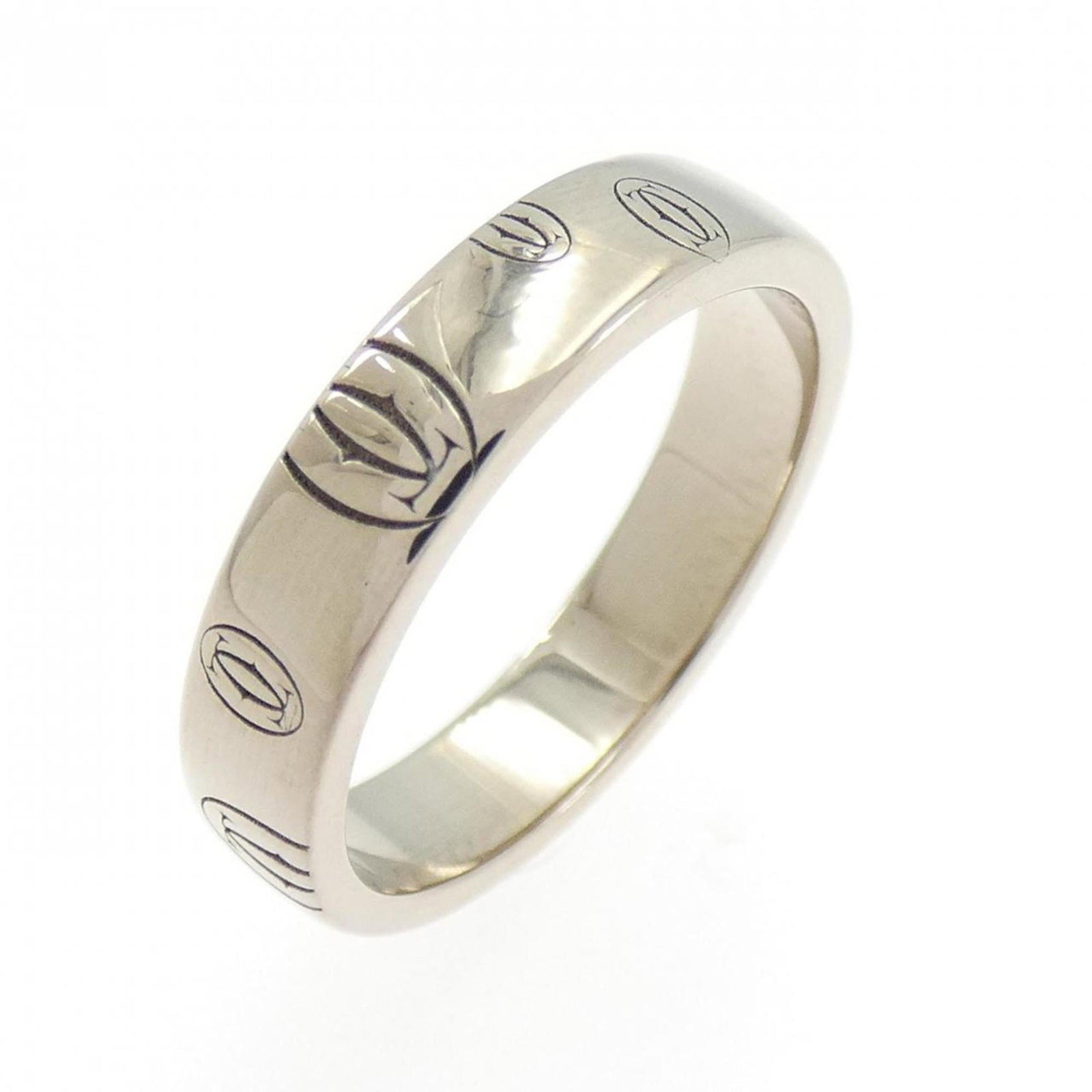 White Gold Band Ring by Cartier 18K: White Gold Band Ring by Cartier 18K Cartier's iconic band ring in white gold (18K) boasts sleek simplicity, making it a timeless addition to any jewelry collection. This 18K white gold band features t