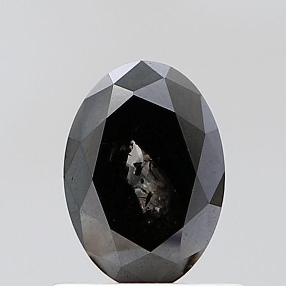 Oval 0.78ct Black VVS2 - Loose Natural Diamond: Oval 0.78ct Black VVS2 - Loose Natural Diamond Oval cut, 0.78ct black diamond with exceptional clarity and polish, boasting an EX symmetry. This natural Fancy diamond features a VVS2 clarity grade and