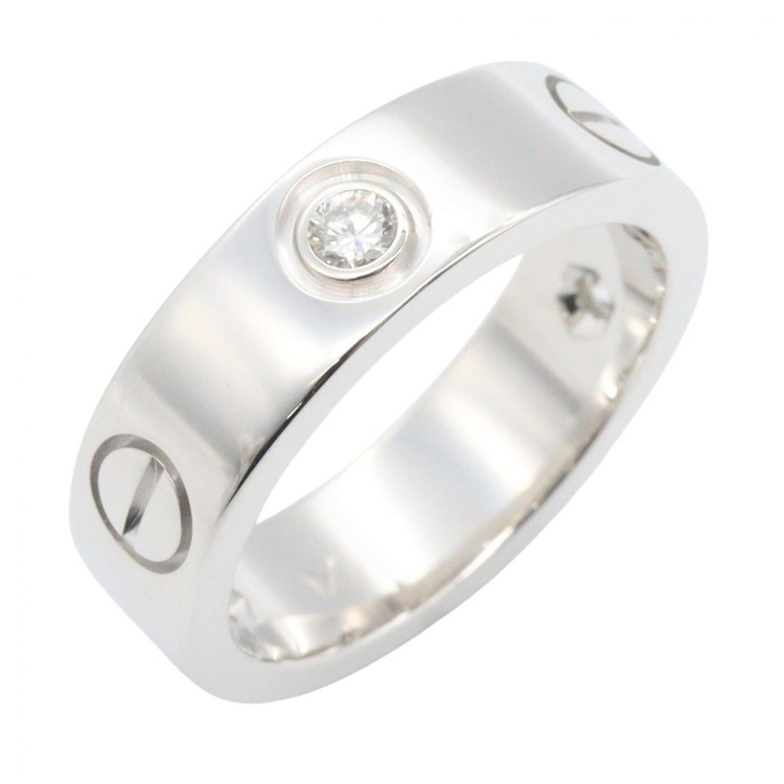 White Gold 18K Cartier Ring Band: White Gold 18K Cartier Ring Band White gold (18K) Cartier ring band with clear, silver tone and US size 5.5. This elegant band features the renowned Cartier brand and high-quality white gold material.