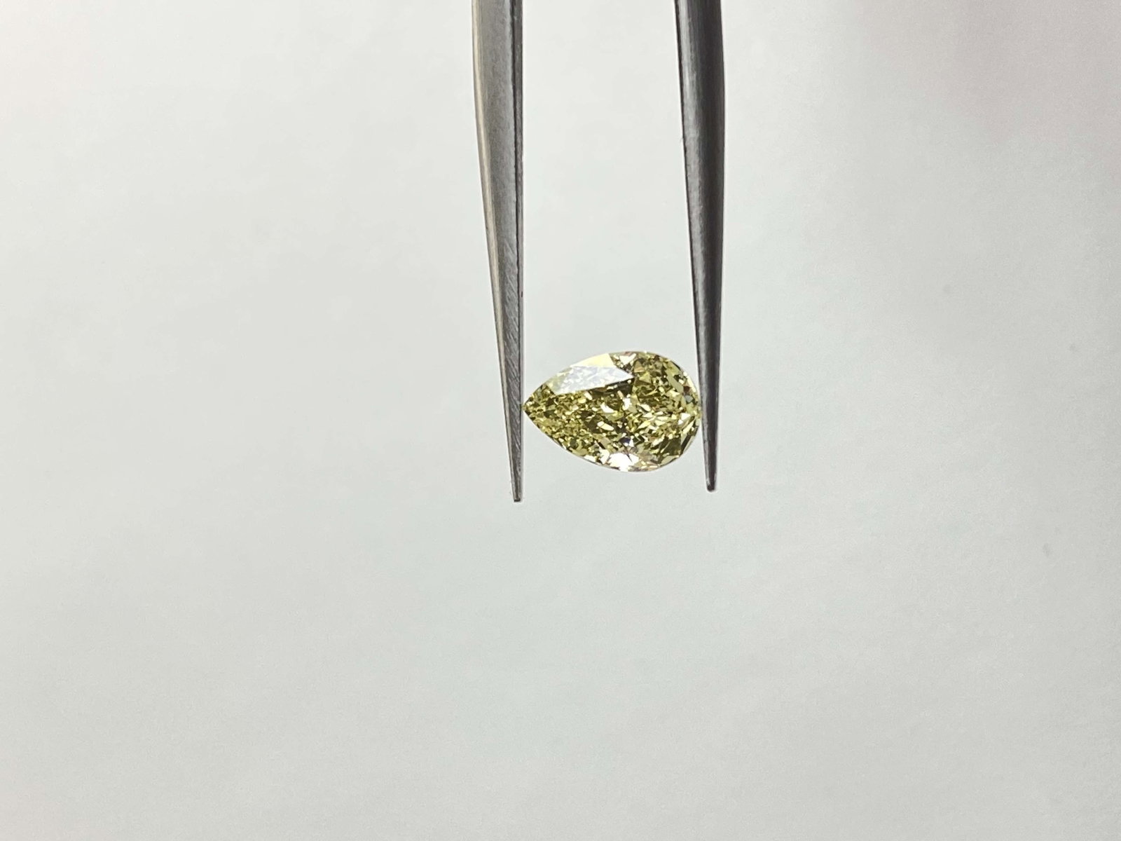 GIA Pear 1.08ct Fancy Yellow VVS1 - Loose Natural Diamond: GIA Pear 1.08ct Fancy Yellow VVS1 - Loose Natural Diamond GIA-certified Fancy Yellow VVS1 diamond, measuring 8.32L x 5.6W x 3.38H, boasts exceptional clarity and vibrant yellow hue. This natural,