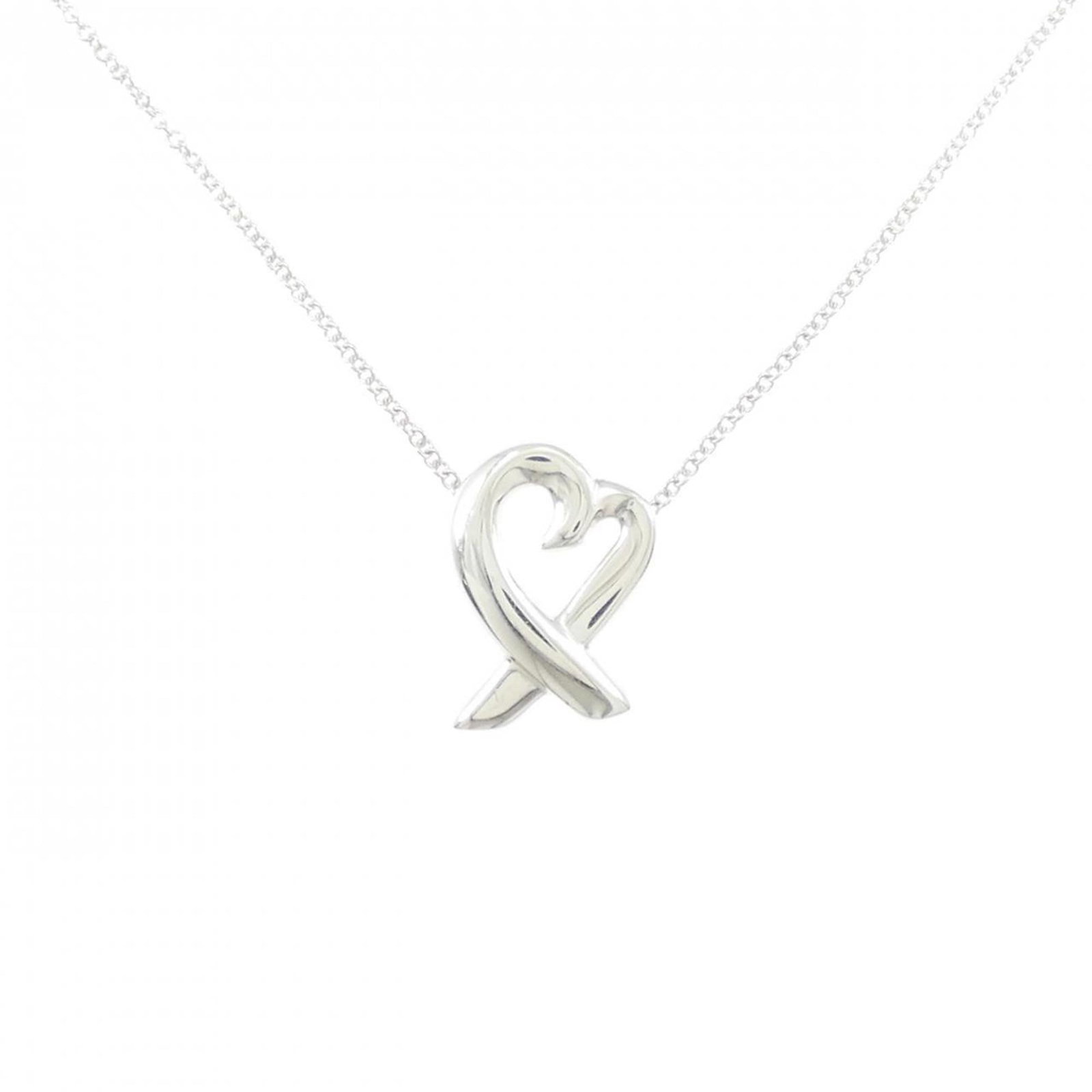 Small Heart Necklace by Tiffany: Small Heart Necklace by Tiffany Small Heart Necklace by Tiffany features a delicate silver pendant with a classic design, measuring 15.9mm x 11.3mm. This sterling silver necklace has a weight of 2.9g