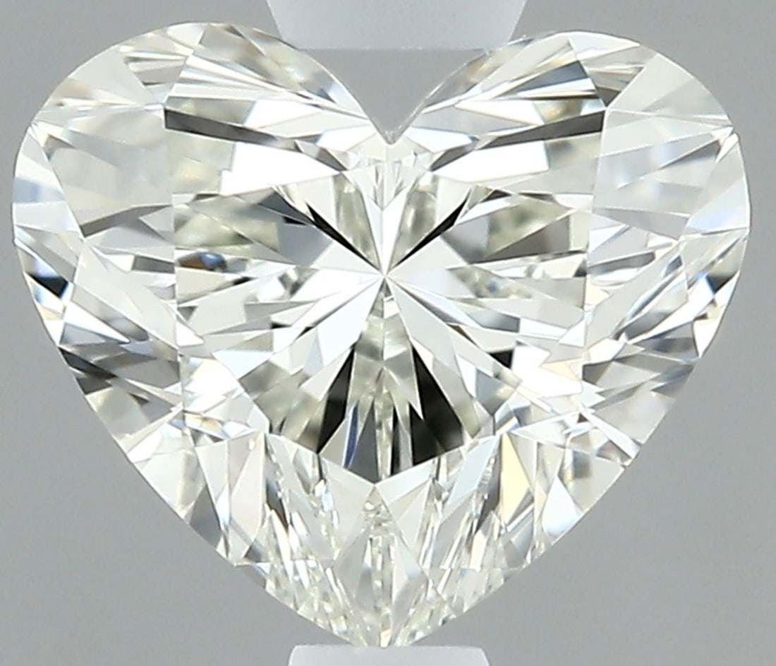 IGI Heart 0.7ct I VVS1 - Loose Natural Diamond: IGI Heart 0.7ct I VVS1 - Loose Natural Diamond IGI Heart 0.7ct I VVS1 - Loose Natural Diamond, certified by the International Gemological Institute (IGI), boasts exceptional clarity and polish with an