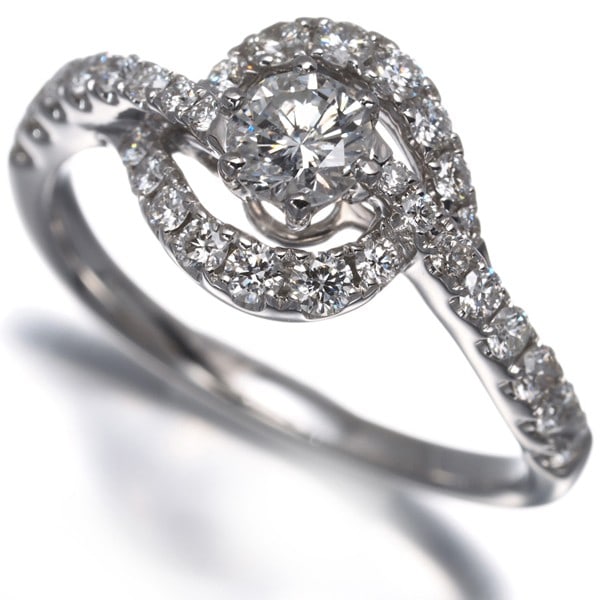 Diamond 0.309Ct/ 0.51Ct Wave Ring 18K 750 White Gold: Diamond 0.309Ct/ 0.51Ct Wave Ring 18K 750 White Gold The 0.309ct and 0.51ct diamond wave ring in 18k white gold features two natural diamonds, one at the centre with a diameter of approximately 4.3mm