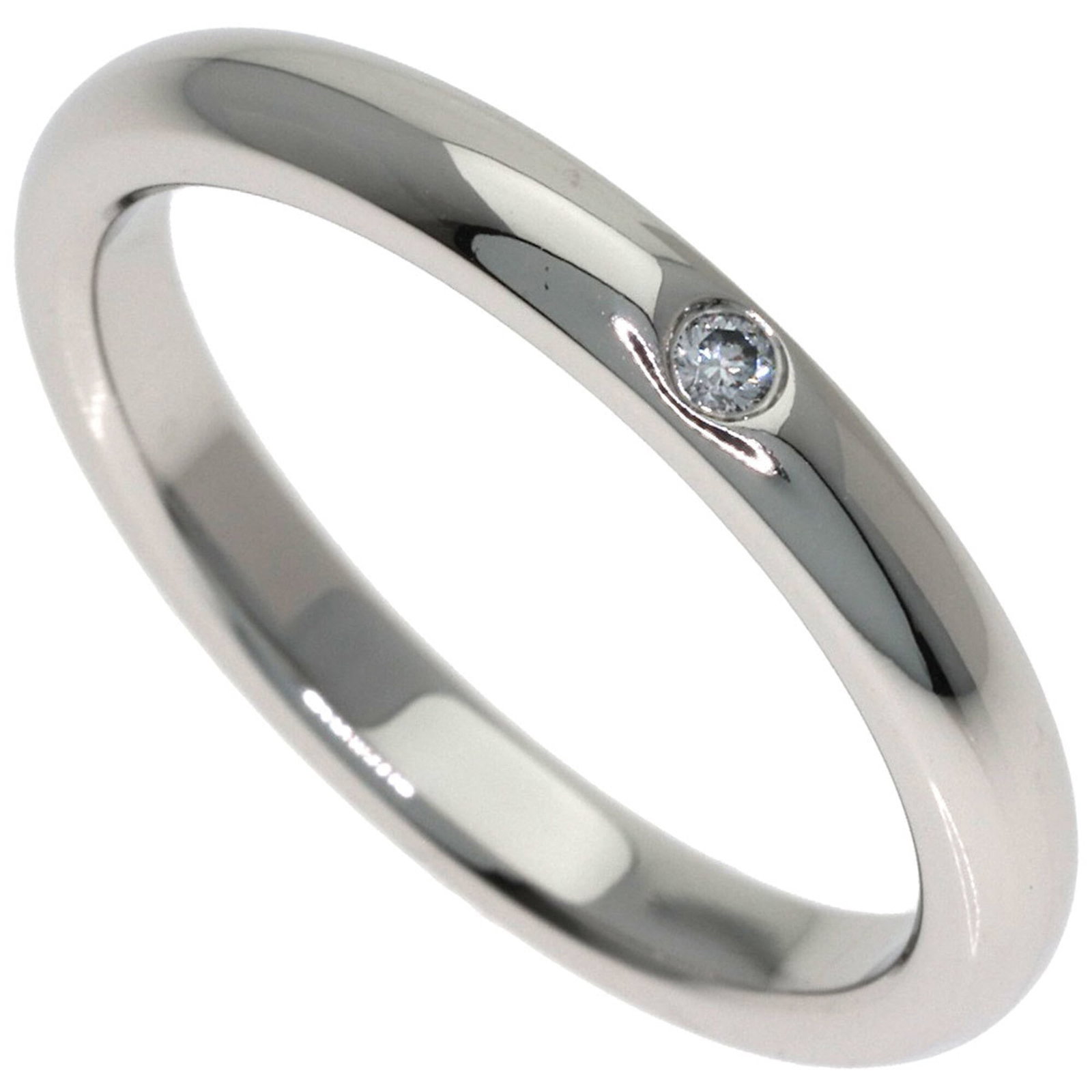 Ring Tiffany Band: Ring Tiffany Band Tiffany Type band ring in platinum, featuring a diamond stone and measuring 6.5 US size with a width of 2.7mm. This platinum950 metal band boasts a weight of 5.6g, showcasing a sleek