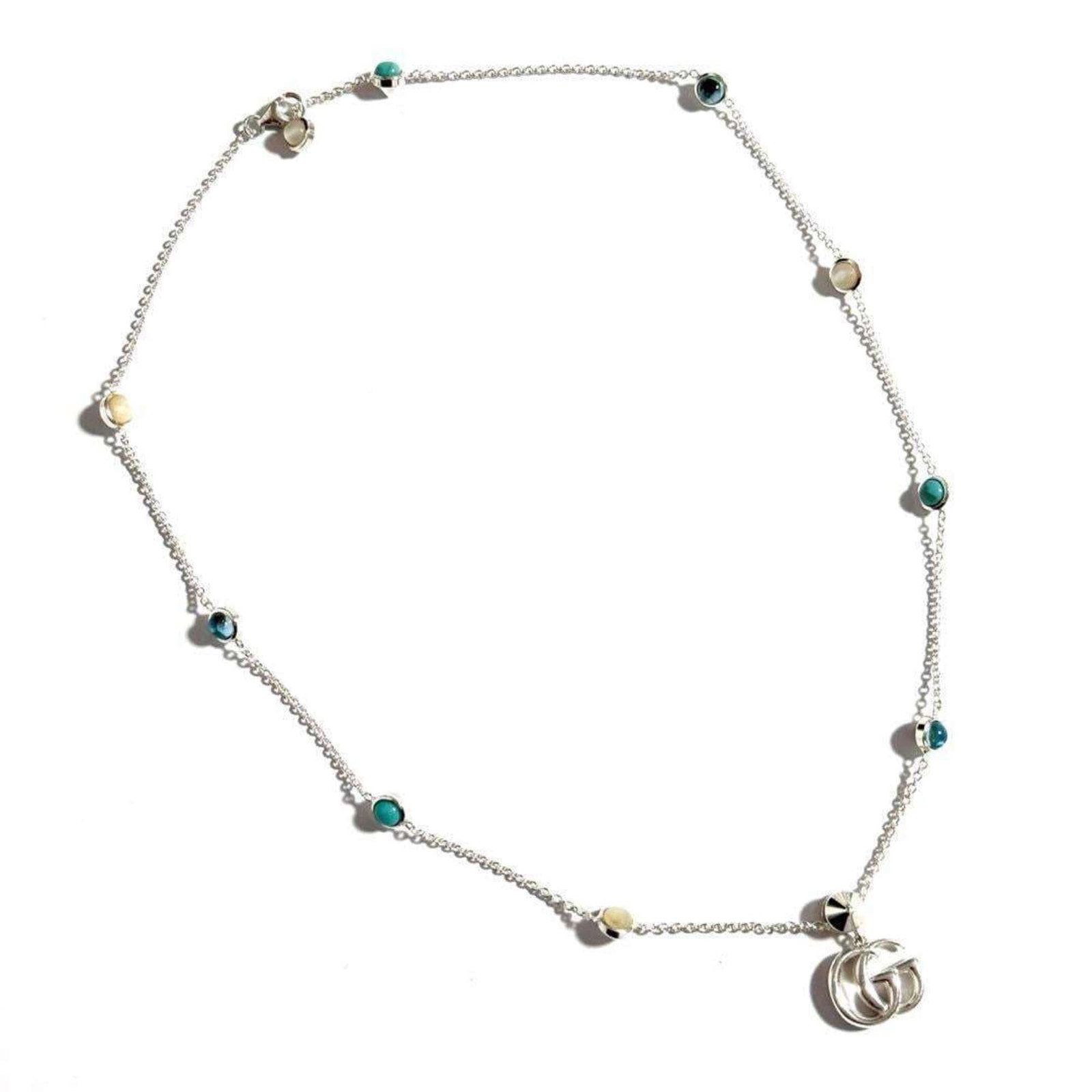Silver Gucci Mother Of Pearl Pendant Necklace Double G 925: Silver Gucci Mother Of Pearl Pendant Necklace Double G 925 Silver Gucci Mother Of Pearl Pendant Necklace Double G 925. This elegant necklace features a striking silver pendant adorned with mother of