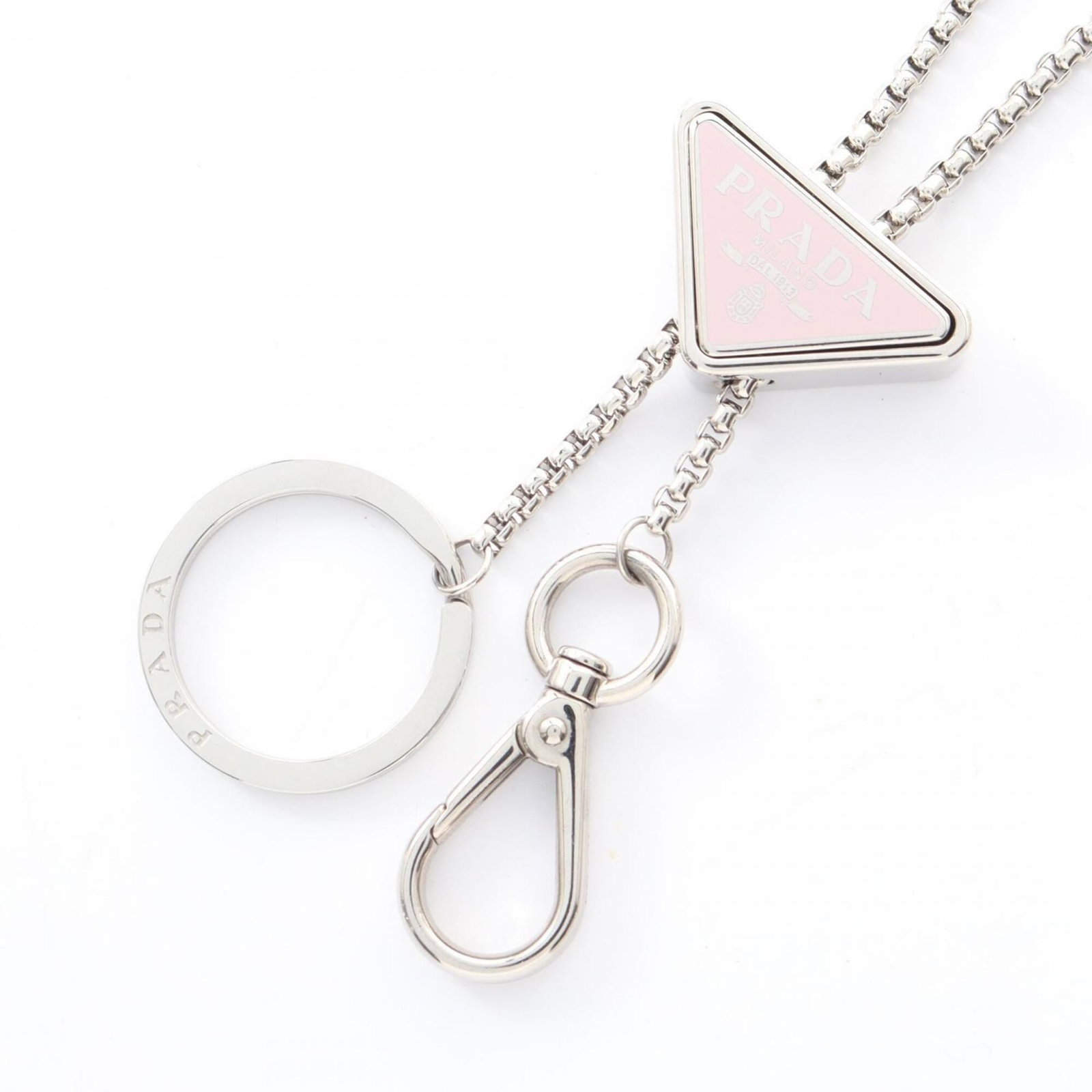 Women's silver tone stainless steel keychain necklace jewelry Prada: Women's silver tone stainless steel keychain necklace jewelry Prada Stainless steel and silver tone come together in this sleek Prada necklace, featuring a 20mm x 35mm pendant that adds a touch of