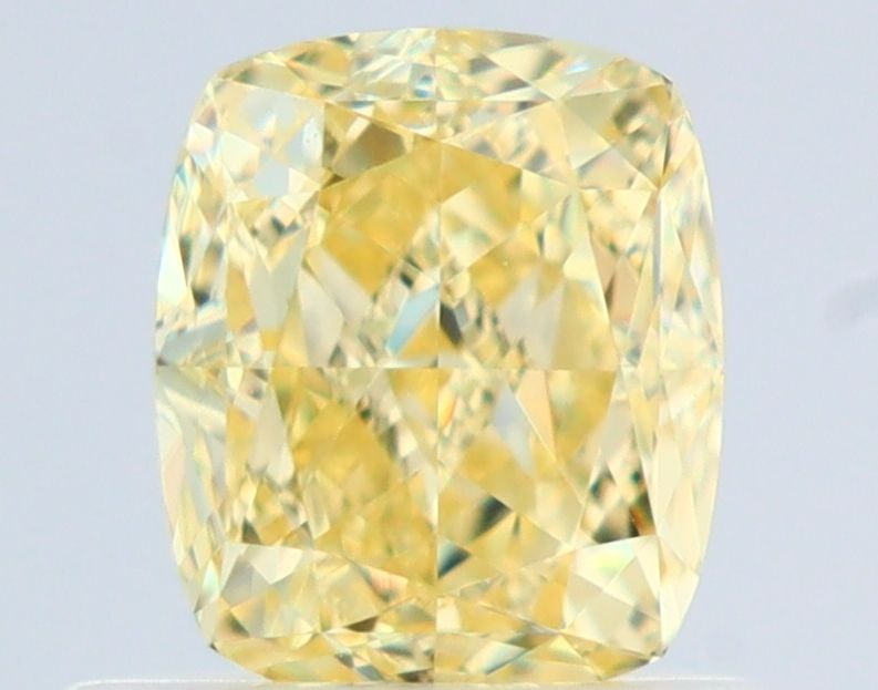 GIA Cushion Brilliant 0.75ct Fancy Yellow VVS2 - Loose Natural Diamond: GIA Cushion Brilliant 0.75ct Fancy Yellow VVS2 - Loose Natural Diamond GIA certified, this 0.75ct Fancy Yellow VVS2 diamond boasts exceptional color and clarity, with an EX polish and VG symmetry. Mea