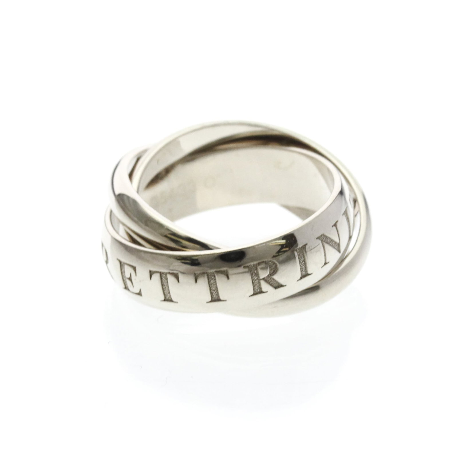 White Gold Band Ring by Cartier 18K: White Gold Band Ring by Cartier 18K Cartier's iconic Trinity Ring in white gold, crafted with 18K purity for a luxurious touch. This Christmas Limited Edition band ring boasts a sleek design and slend