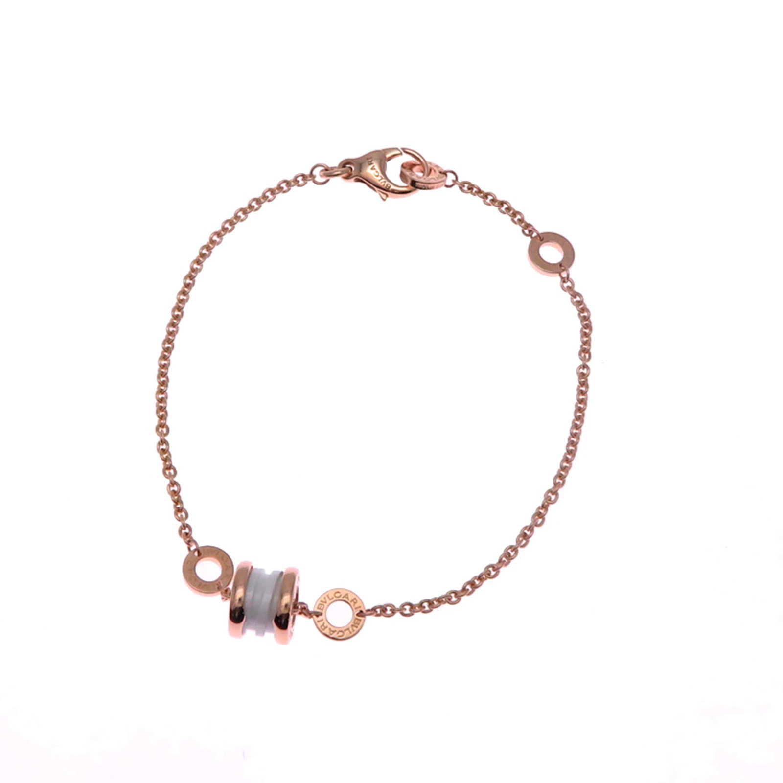 Charm Bvlgari Pink Gold Ceramic: Charm Bvlgari Pink Gold Ceramic Bvlgari Pink Gold Ceramic Charm bracelet boasts a unique blend of Italian craftsmanship and elegant design, featuring a ceramic and pink gold construction. Measuring be