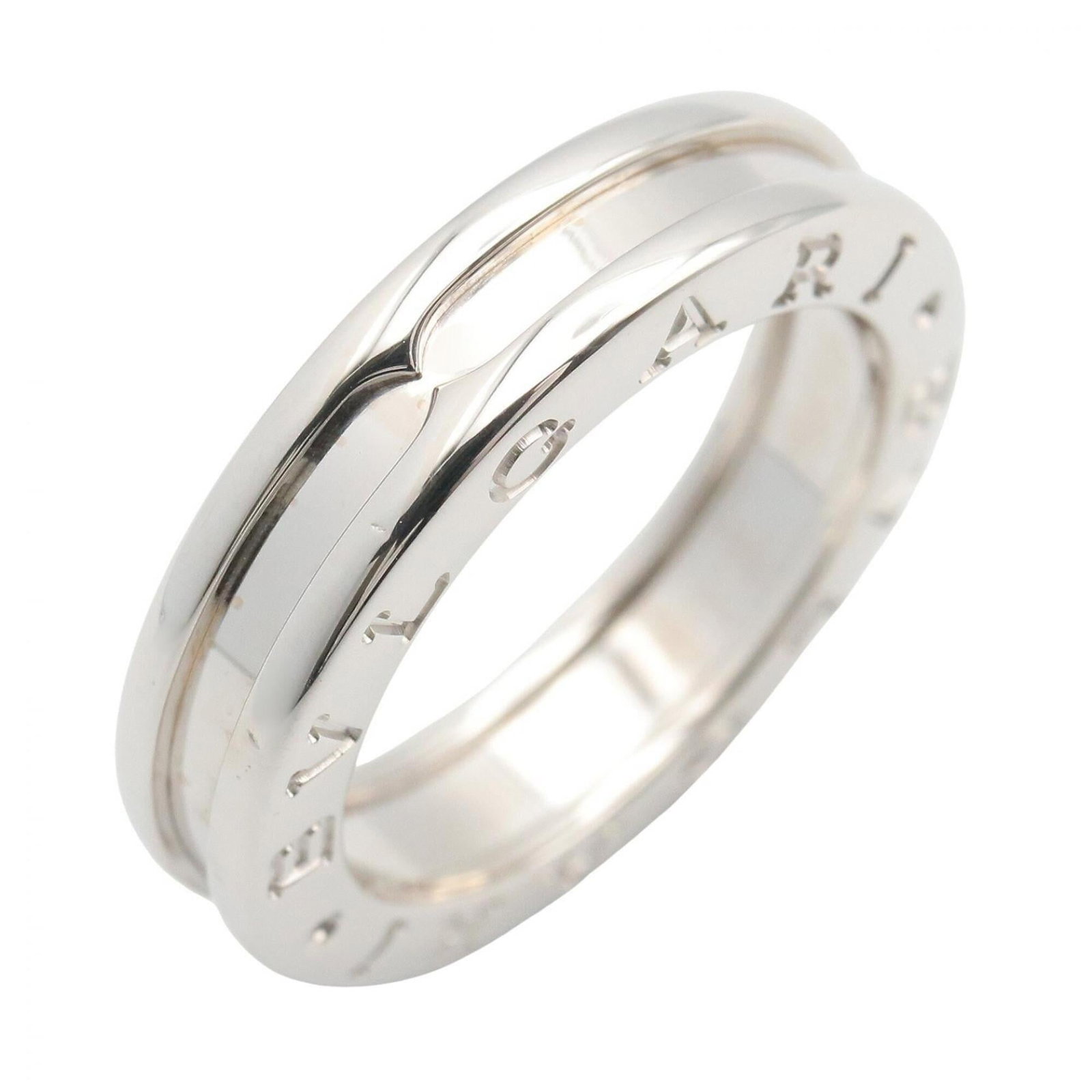 Bvlgari Band Ring White Gold (18K): Bvlgari Band Ring White Gold (18K) Bvlgari Band Ring White Gold (18K) - A sleek and sophisticated band ring crafted from high-quality white gold, available in a US size 5.5. This elegant piece feature