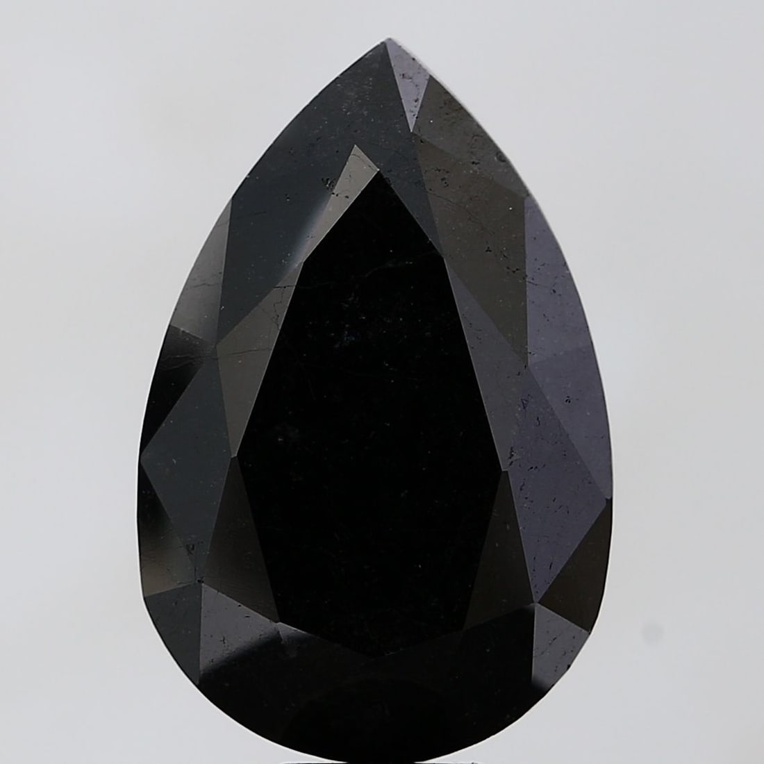 Pear 16.87ct Black VVS2 - Loose Natural Diamond: Pear 16.87ct Black VVS2 - Loose Natural Diamond 16.87ct Black VVS2 - Loose Natural Diamond, boasting exceptional clarity and polish with EX symmetry, sits atop an impressive 19.24L x 12.59W x 8.97H na