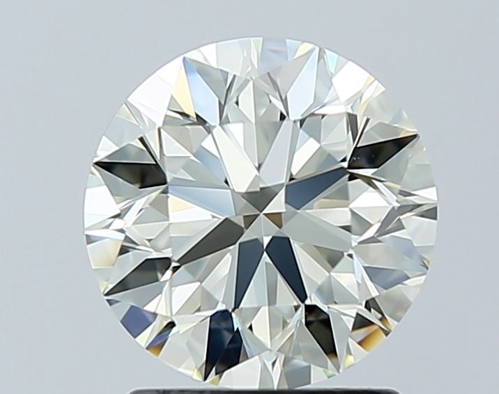 IGI Round 1.5ct L VVS2 - Loose Natural Diamond: IGI Round 1.5ct L VVS2 - Loose Natural Diamond The IGI Round 1.5ct L VVS2 diamond boasts exceptional clarity and polish, with its EX symmetry and EX polish showcasing a brilliant, fire-filled appearan