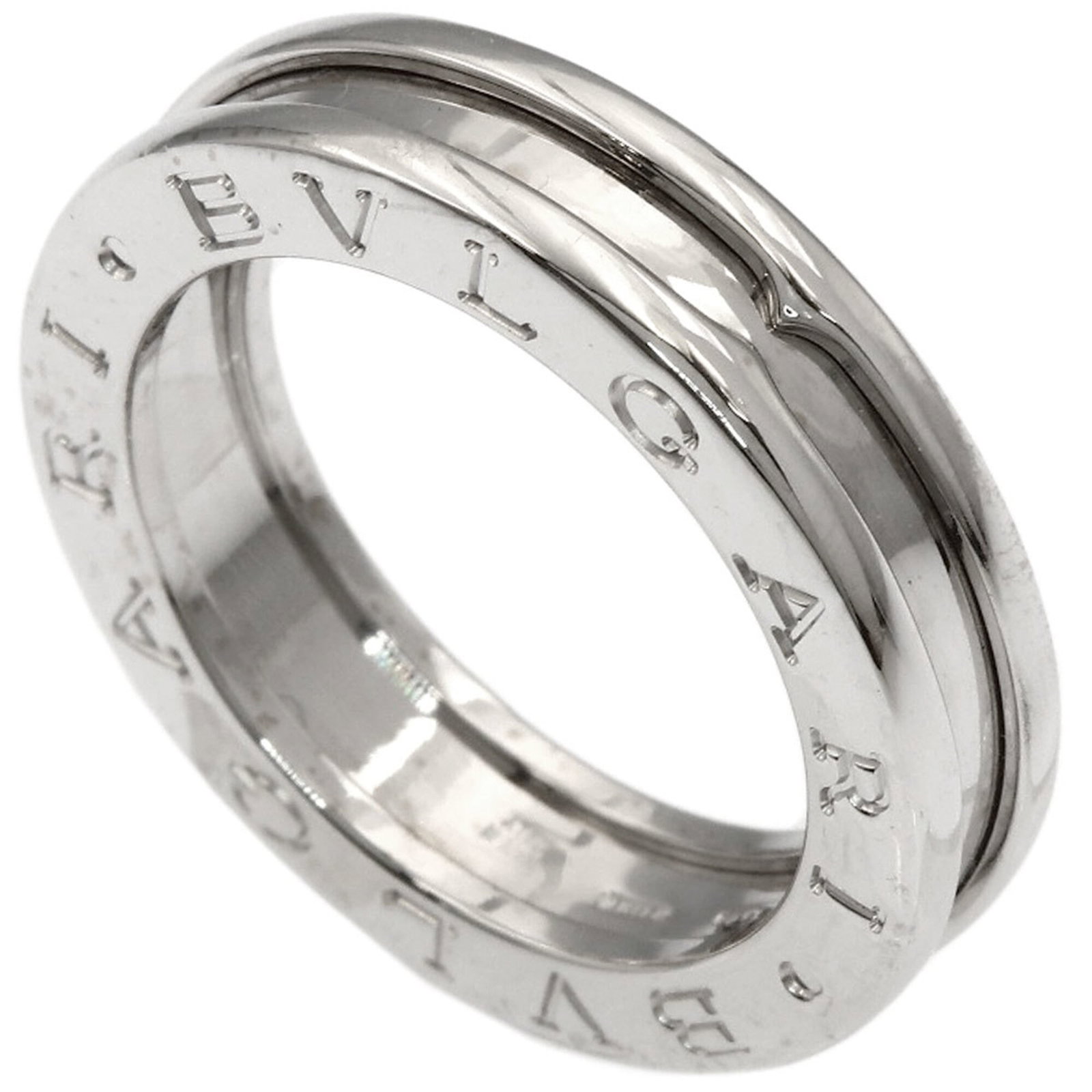 Bvlgari Band Ring White Gold (18K): Bvlgari Band Ring White Gold (18K) Bvlgari Band Ring White Gold (18K) - A sleek and modern band ring crafted from high-quality white gold, featuring a classic design that complements any style. This 1