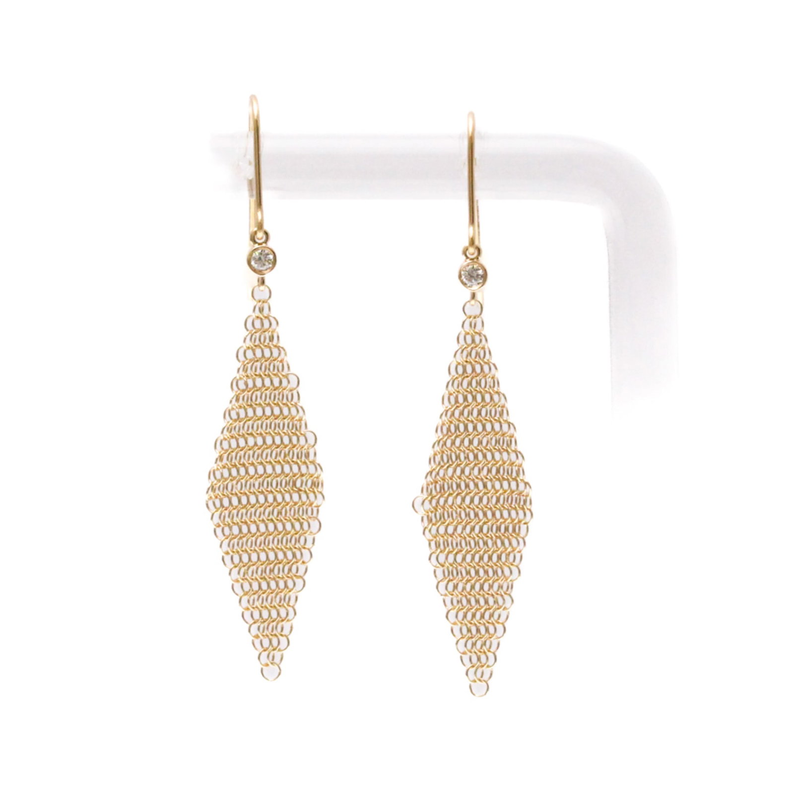 Pink Gold Drop Earrings Tiffany: Pink Gold Drop Earrings Tiffany Pink gold mesh drop earrings from Tiffany, featuring diamonds and a sleek design. Made with 18K pink gold, these statement earrings boast a unique mesh pattern and a su