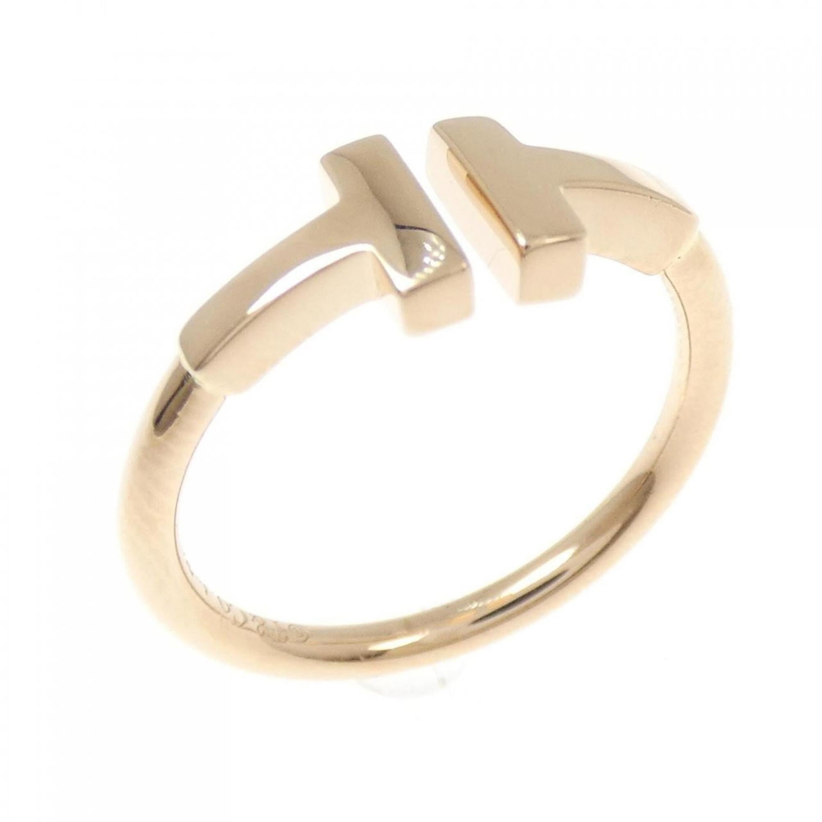 Tiffany Band Ring Pink Gold (18K): Tiffany Band Ring Pink Gold (18K) Pink gold (18K) band ring with a classic design, available in US size 5. This Tiffany piece features a timeless style that suits women's fashion. Made from high-quali