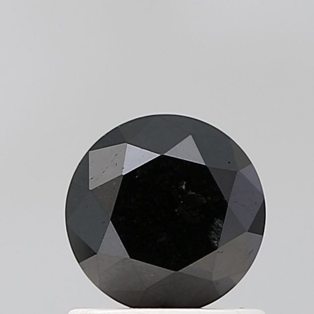 Round 0.81ct Black VVS2 - Loose Natural Diamond: Round 0.81ct Black VVS2 - Loose Natural Diamond 0.81ct Black VVS2 - Loose Natural Diamond, certified NONE and bearing EX polish, symmetry, and clarity. This natural diamond boasts a rare black color a