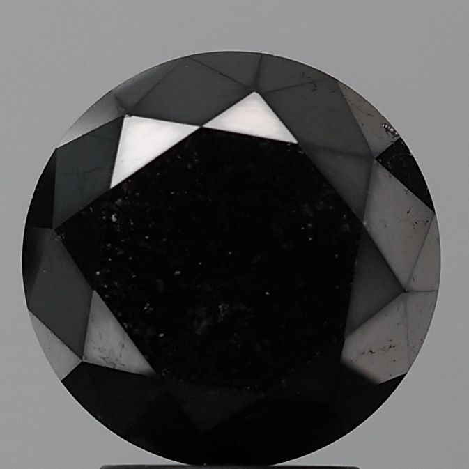 Round 1.28ct Black VVS2 - Loose Natural Diamond: Round 1.28ct Black VVS2 - Loose Natural Diamond 1.28ct black diamond with exceptional clarity and polish, boasting an EX cut and VVS2 clarity grade. Its EX symmetry ensures a perfectly proportioned st