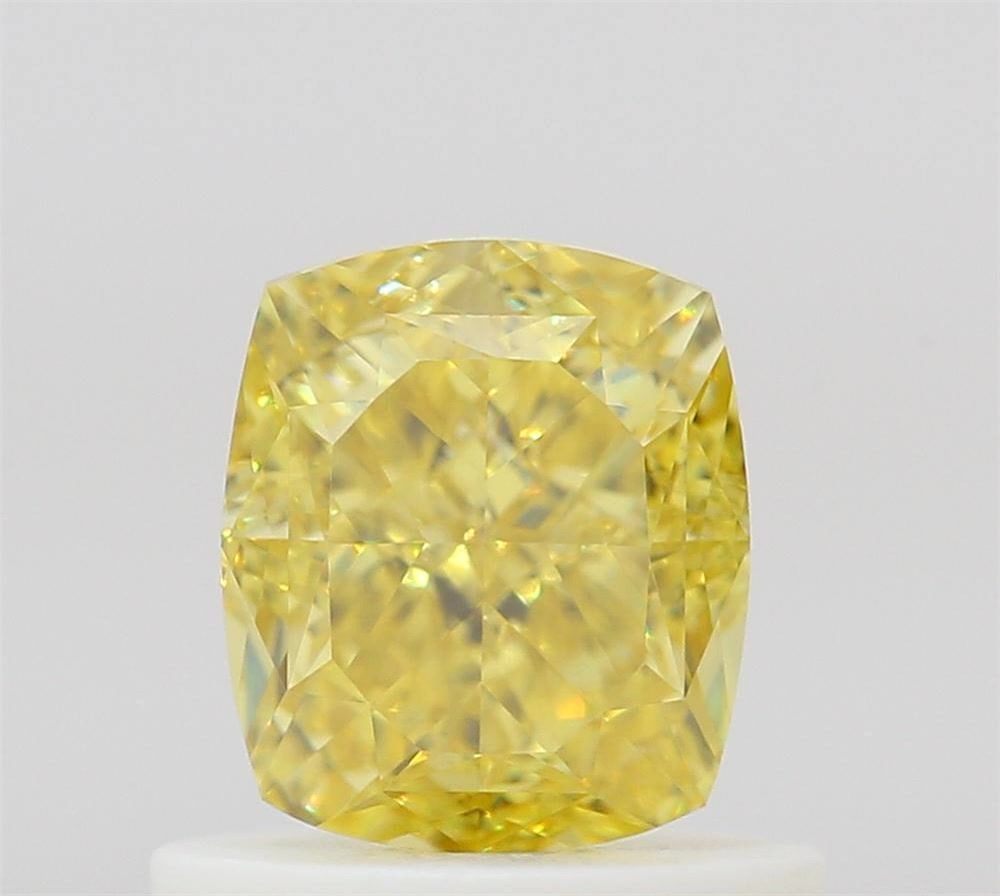 GIA Cushion Brilliant 0.8ct Fancy Vivid Yellow VVS2 - Loose Natural Diamond: GIA Cushion Brilliant 0.8ct Fancy Vivid Yellow VVS2 - Loose Natural Diamond GIA certified, this loose natural diamond boasts an impressive 0.8 carat Fancy Vivid Yellow VVS2 color grade, showcasing exc
