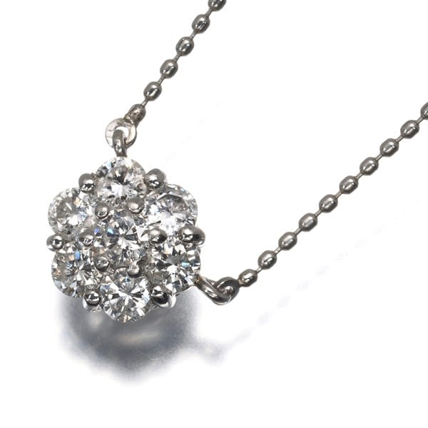 Diamond 0.50Ct Flower Paved Necklace 900 850 Platinum: Diamond 0.50Ct Flower Paved Necklace 900 850 Platinum 900 / 850 Platinum Diamond Flower Paved Necklace showcases a stunning natural diamond pendant, set amidst a delicate flower design. The necklace f