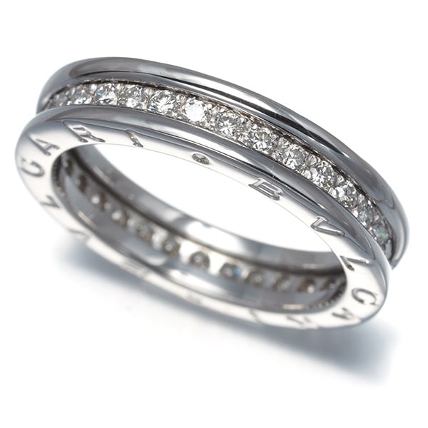 Bvlgari Ring Diamond B.Zero1 Xs Eu53 18K 750 White Gold: Bvlgari Ring Diamond B.Zero1 Xs Eu53 18K 750 White Gold BVLGARI's B.Zero1 Xs Eu53 ring boasts an exquisite 18k white gold setting, adorned with a stunning natural diamond. The band's sleek design and