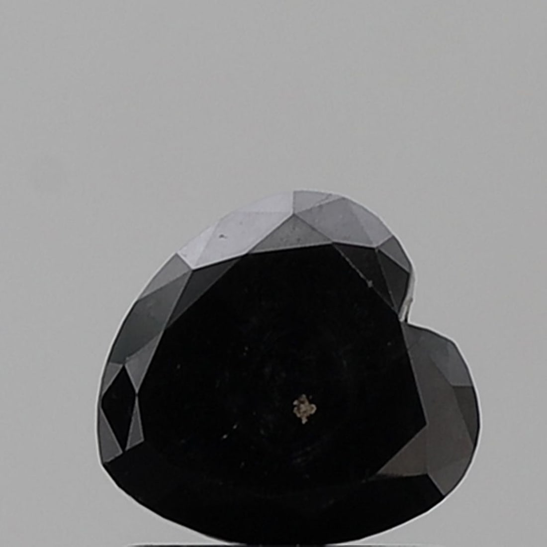 Heart 1.31ct Black VVS2 - Loose Natural Diamond: Heart 1.31ct Black VVS2 - Loose Natural Diamond 1.31ct black diamond with exceptional clarity and polish, featuring a VVS2 grade and EX symmetry, making it a standout among loose natural diamonds. Its