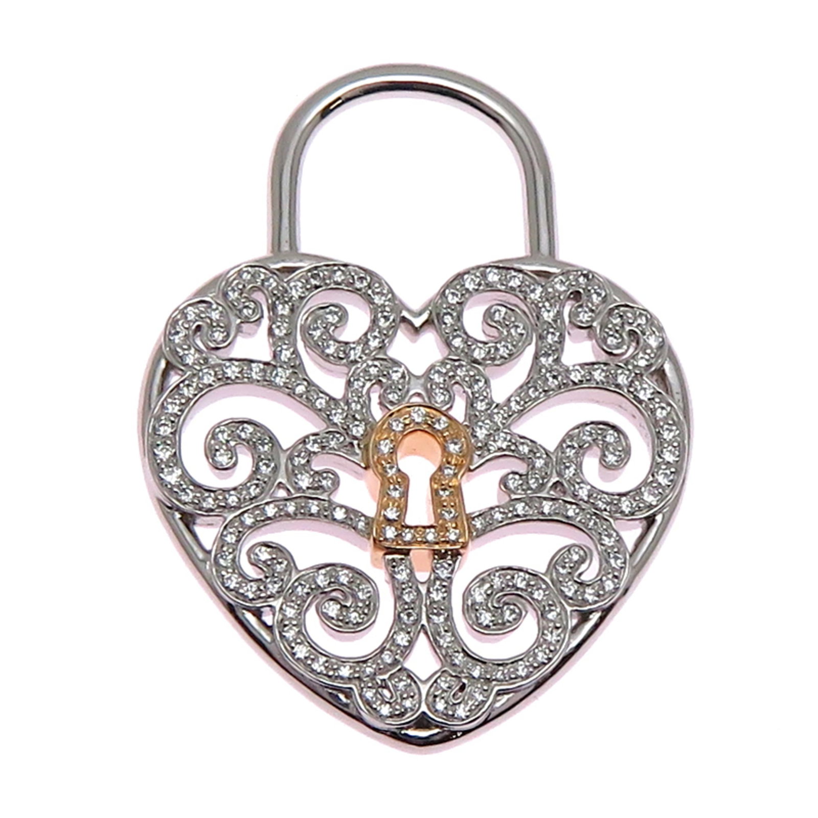 Women's Enchant Pendant Top Platinum Pt950 Tiffany: Women's Enchant Pendant Top Platinum Pt950 Tiffany Pink gold (18K) and platinum 950 combine in this elegant women's pendant top from Tiffany. The 29mm x 22mm diamond-studded design makes a statement, 
