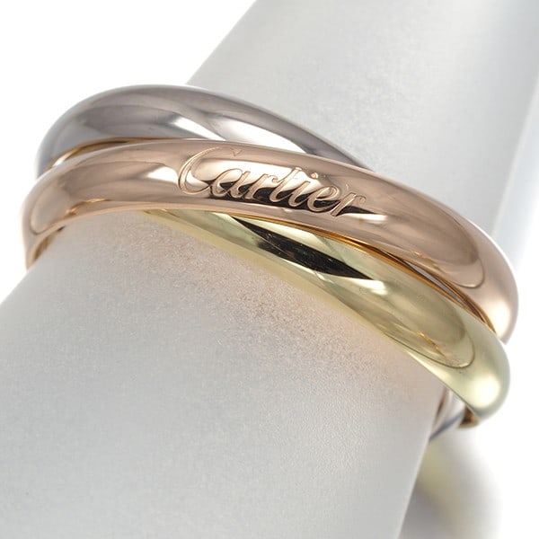 Cartier Ring Trinity 3Color Classic Eu59 18K 750 Yellow White Rose Gold: Cartier Ring Trinity 3Color Classic Eu59 18K 750 Yellow White Rose Gold Cartier's iconic Trinity ring showcases its signature three-tone design, expertly blending 18k yellow, white, and rose gold. Thi