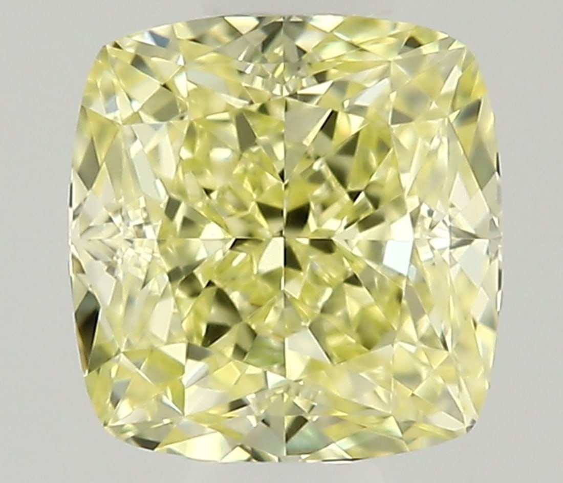 Cushion Modified 0.44ct Fancy Yellow VVS2 - Loose Natural Diamond: Cushion Modified 0.44ct Fancy Yellow VVS2 - Loose Natural Diamond 0.44ct Fancy Yellow VVS2 - Loose Natural Diamond with EX Polish and VG Symmetry, boasting exceptional clarity and vibrant color in a