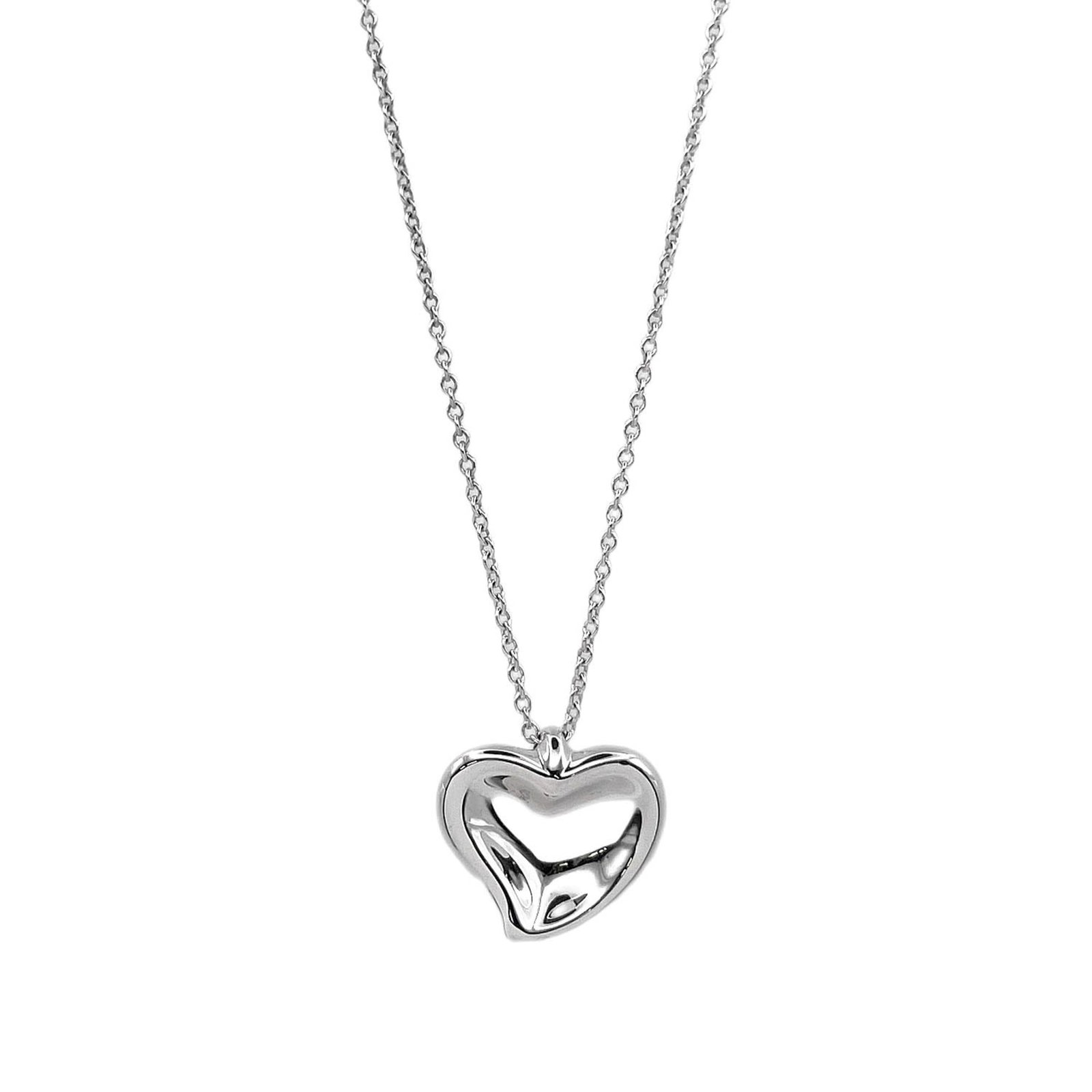 Tiffany & Co. Curved Heart Necklace Pendant By Elsa Peretti Sv925 Silver For Men And Women: Tiffany & Co. Curved Heart Necklace Pendant By Elsa Peretti Sv925 Silver For Men And Women Silver 925 Curved Heart Pendant by Elsa Peretti, available in a sleek necklace design featuring the iconic Ti