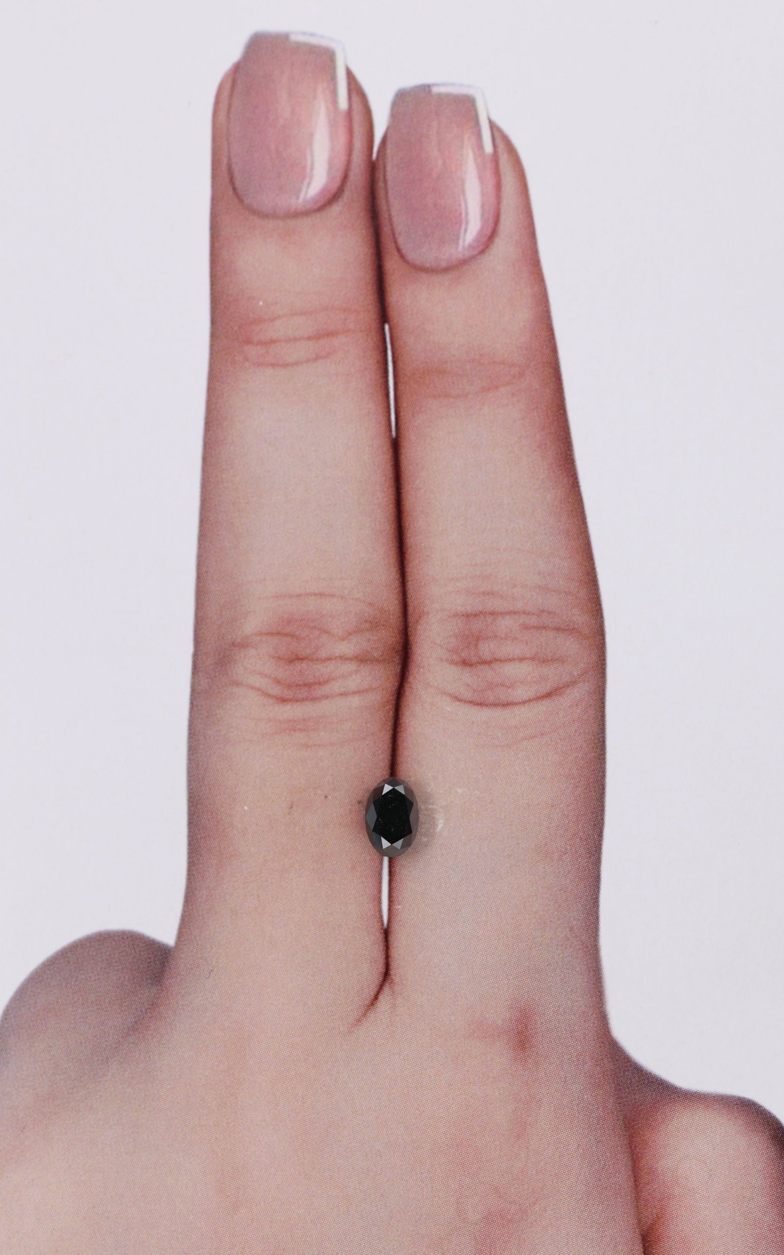 Oval 0.66ct Fancy Black VVS2 - Loose Natural Diamond: Oval 0.66ct Fancy Black VVS2 - Loose Natural Diamond Oval cut diamond with exceptional symmetry and polish, measuring 6.0L x 4.01W x 3.77H. This Fancy Black VVS2 natural diamond boasts an EX polish gr
