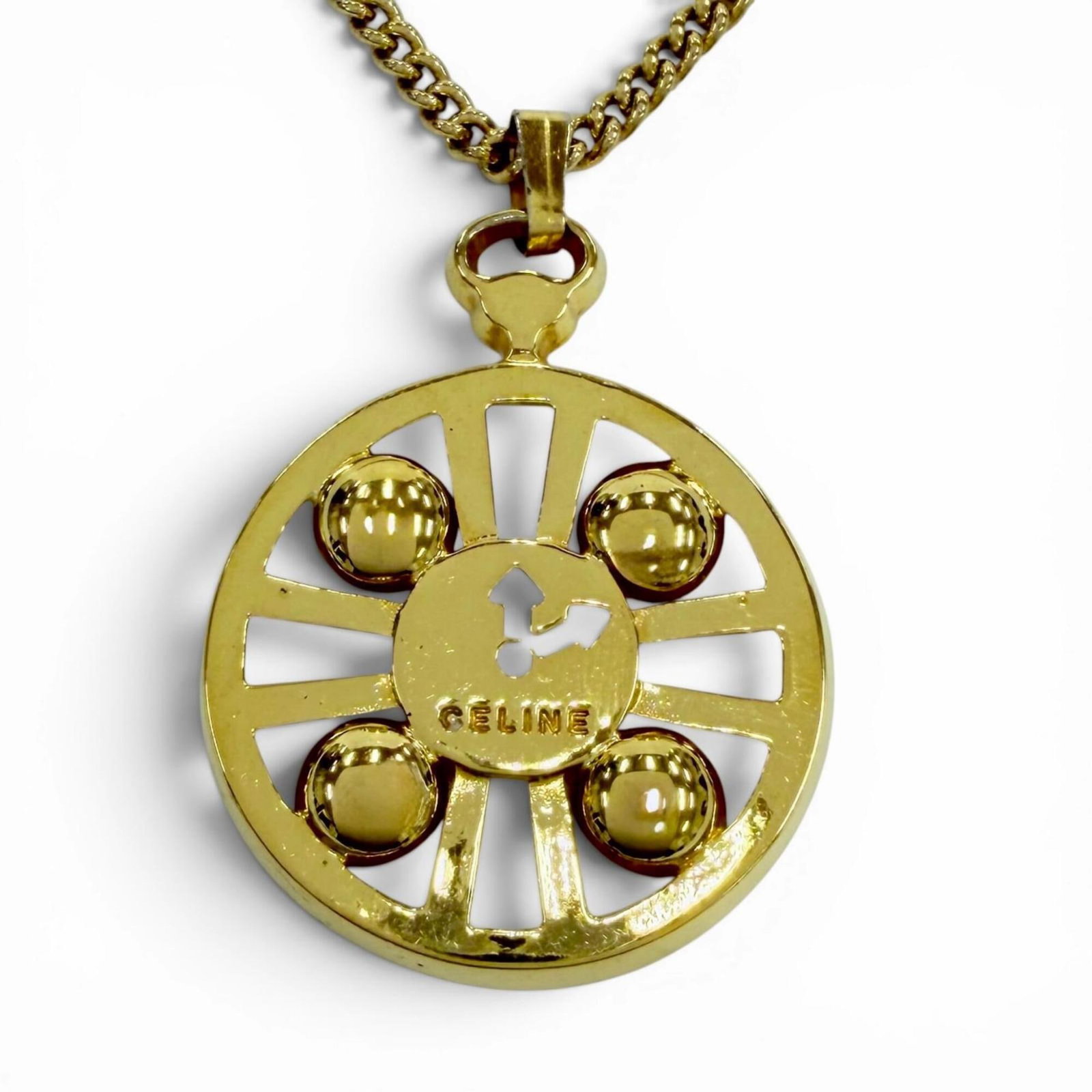 Celine Vintage Metal Watch Motif Logo Chain Pendant Necklace Gold For Women: Celine Vintage Metal Watch Motif Logo Chain Pendant Necklace Gold For Women The Celine Vintage Metal Watch Motif Logo Chain Pendant Necklace is a stunning gold necklace featuring the iconic logo motif