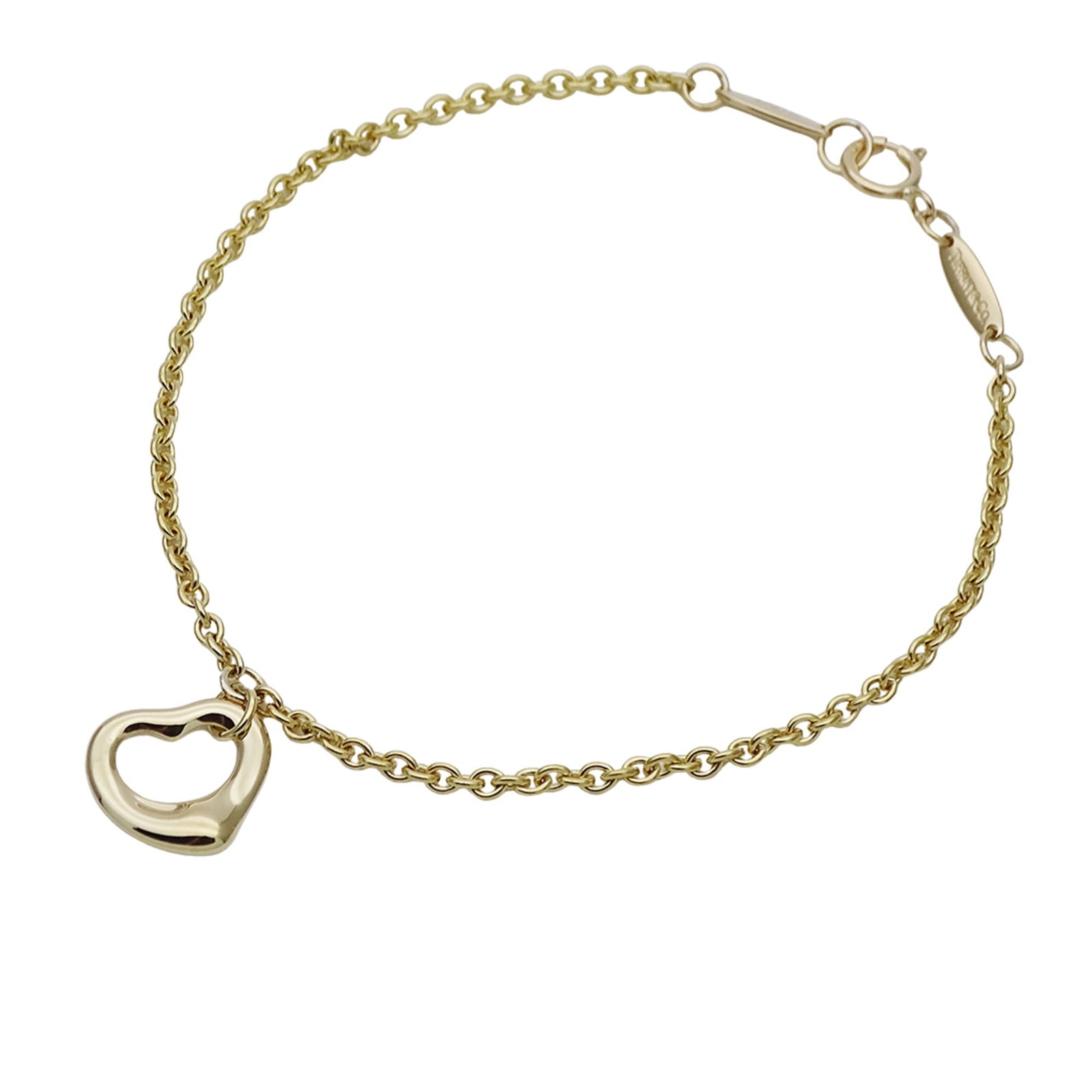 Yellow Gold 18K Charm Tiffany Bracelet: Yellow Gold 18K Charm Tiffany Bracelet Yellow gold (18K) charm Tiffany bracelet with a classic open heart design, crafted in Spain. This elegant 16.5cm length charm bracelet features a beautiful yello